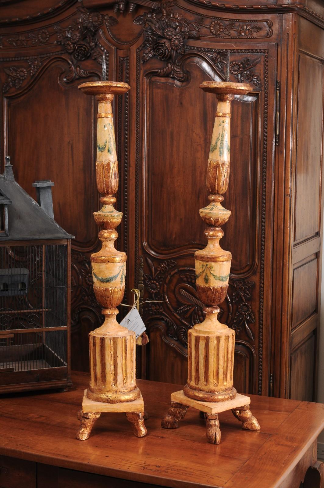 Wood Pair of 18th Century Neoclassical Painted and Gilded Candlesticks with Hoof Feet For Sale