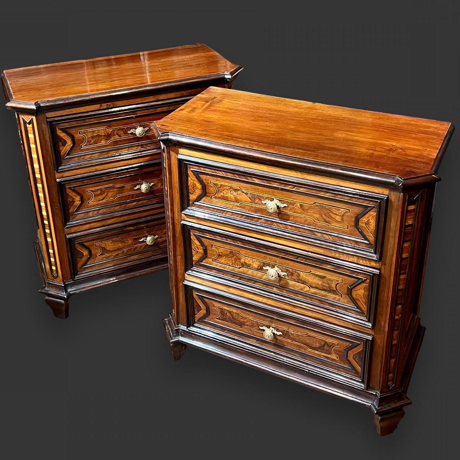 Pair of small 18th century Northern Italian inlaid chest of drawers. Three drawers with inlaid fronts. Striped inlaid detail to the canted corners above carved feet.
