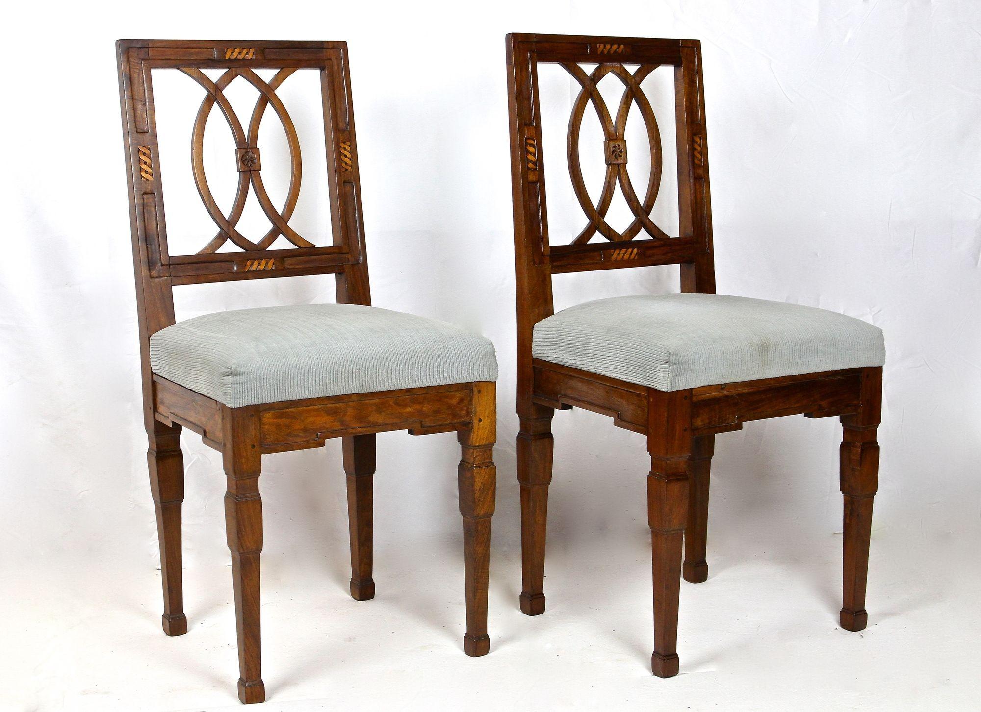 Remarkable pair of 18th century nutwood chairs from the so called 