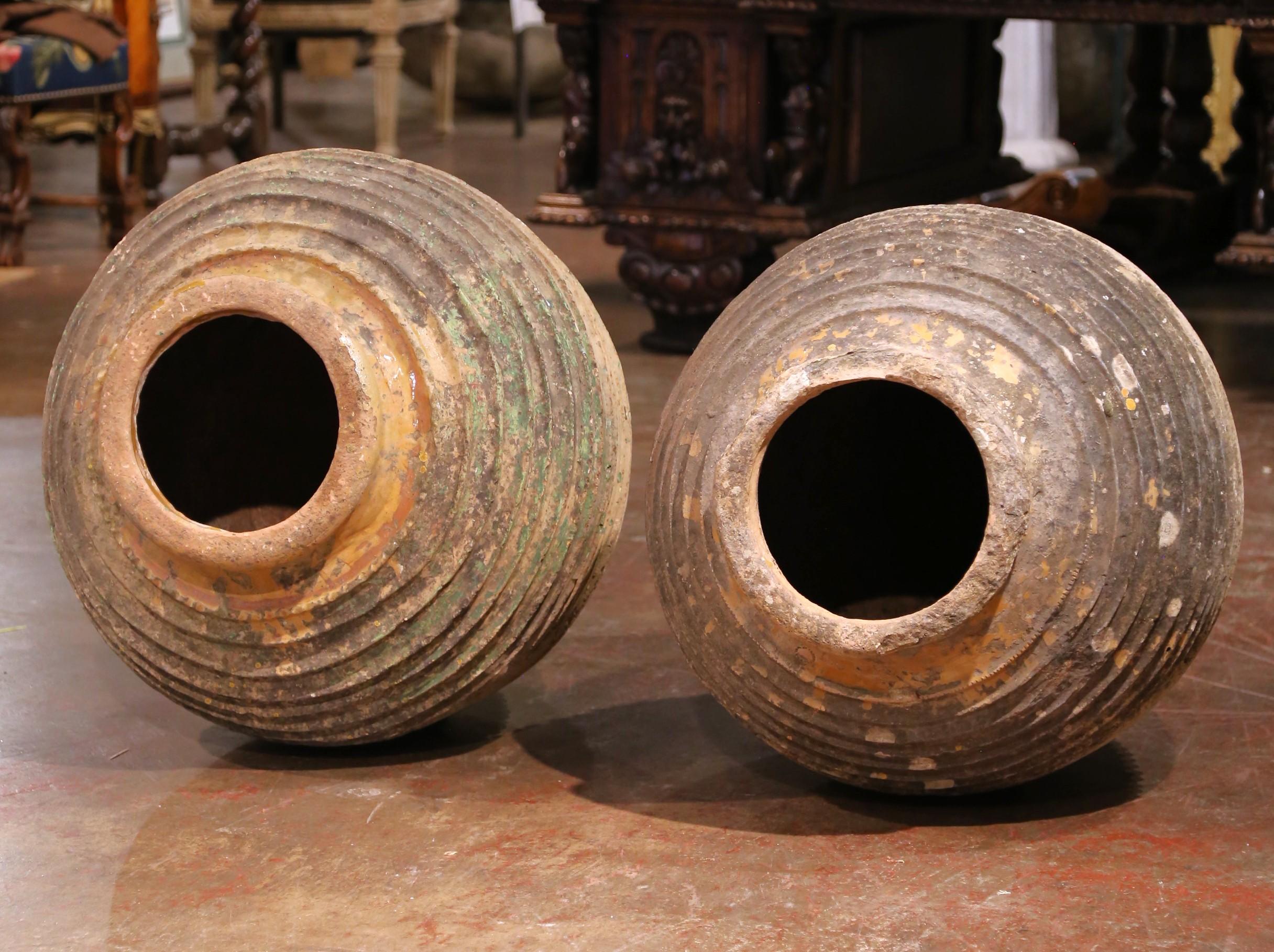 Pair of 18th Century Patinated Greek Terracotta Olive Jars with Ochre Glaze For Sale 9