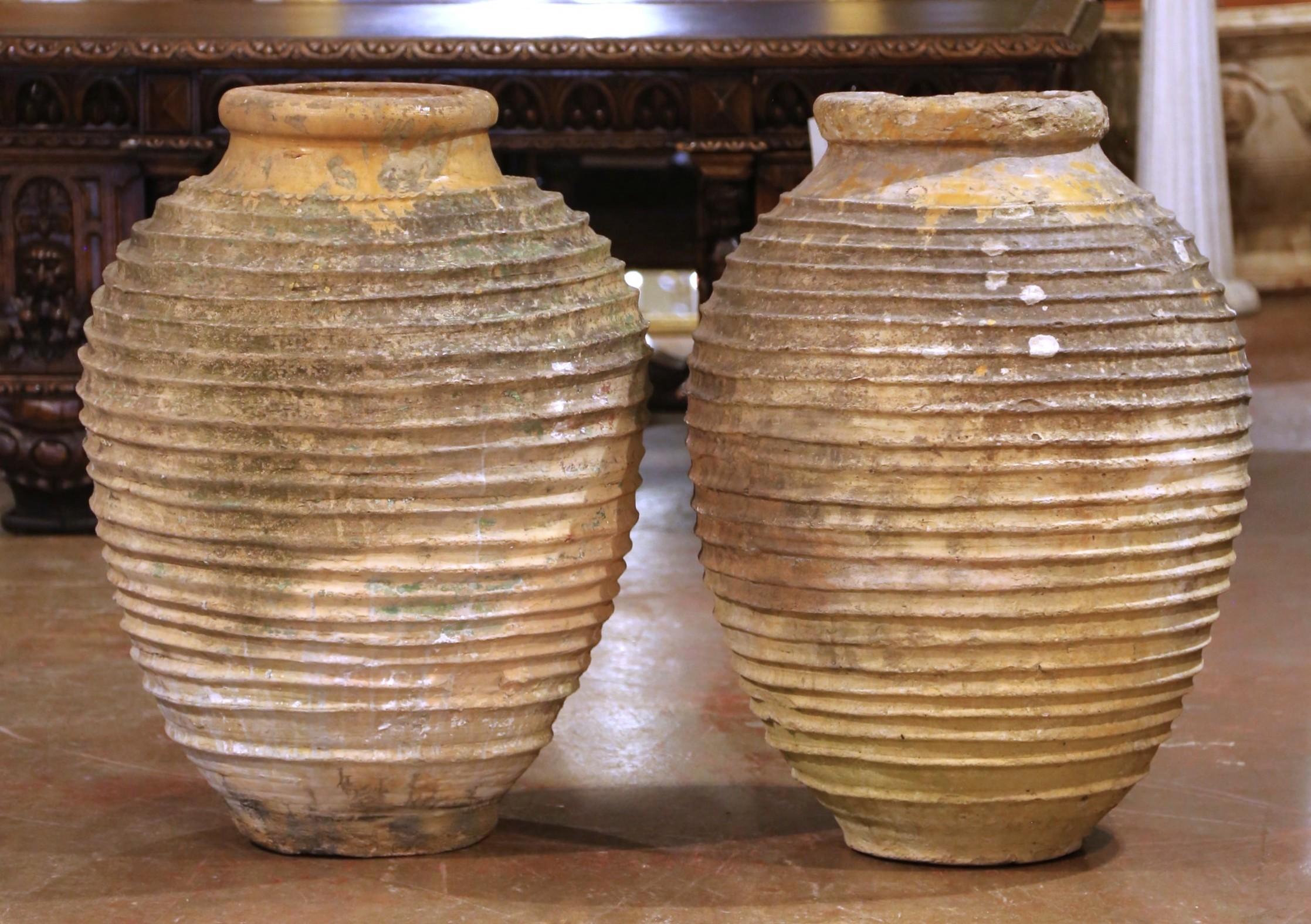 Glazed Pair of 18th Century Patinated Greek Terracotta Olive Jars with Ochre Glaze For Sale