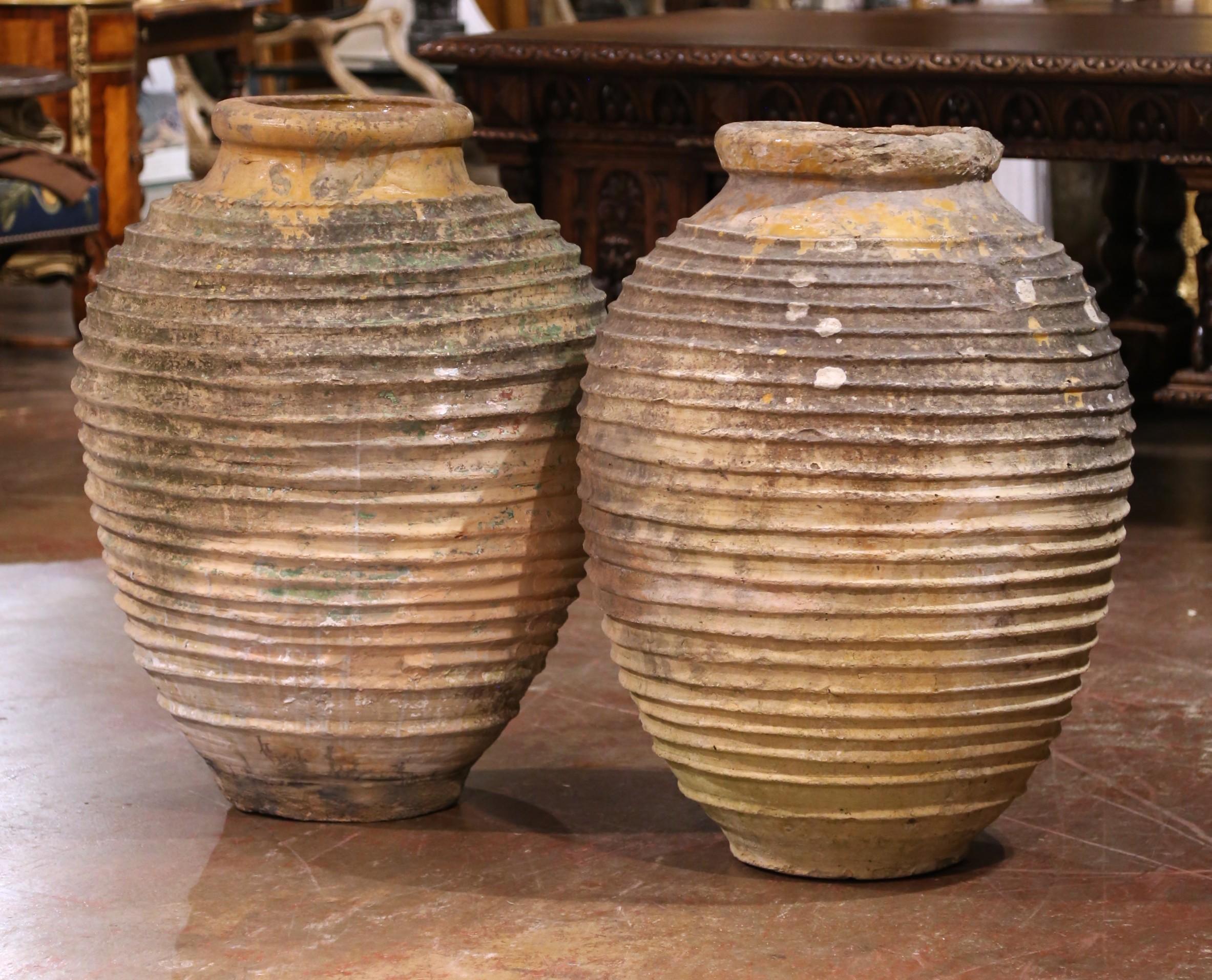 Pair of 18th Century Patinated Greek Terracotta Olive Jars with Ochre Glaze For Sale 1