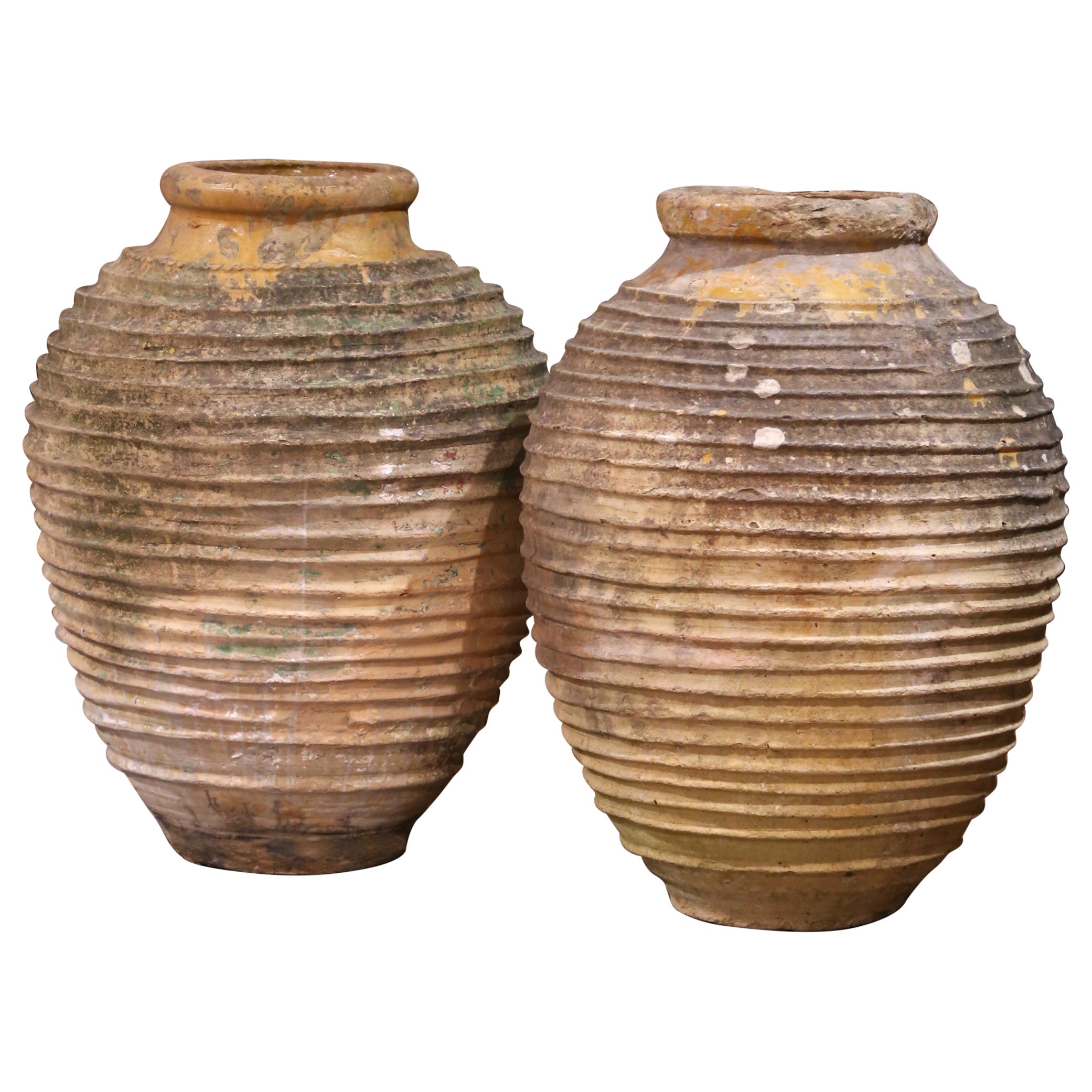 Pair of 18th Century Patinated Greek Terracotta Olive Jars with Ochre Glaze For Sale