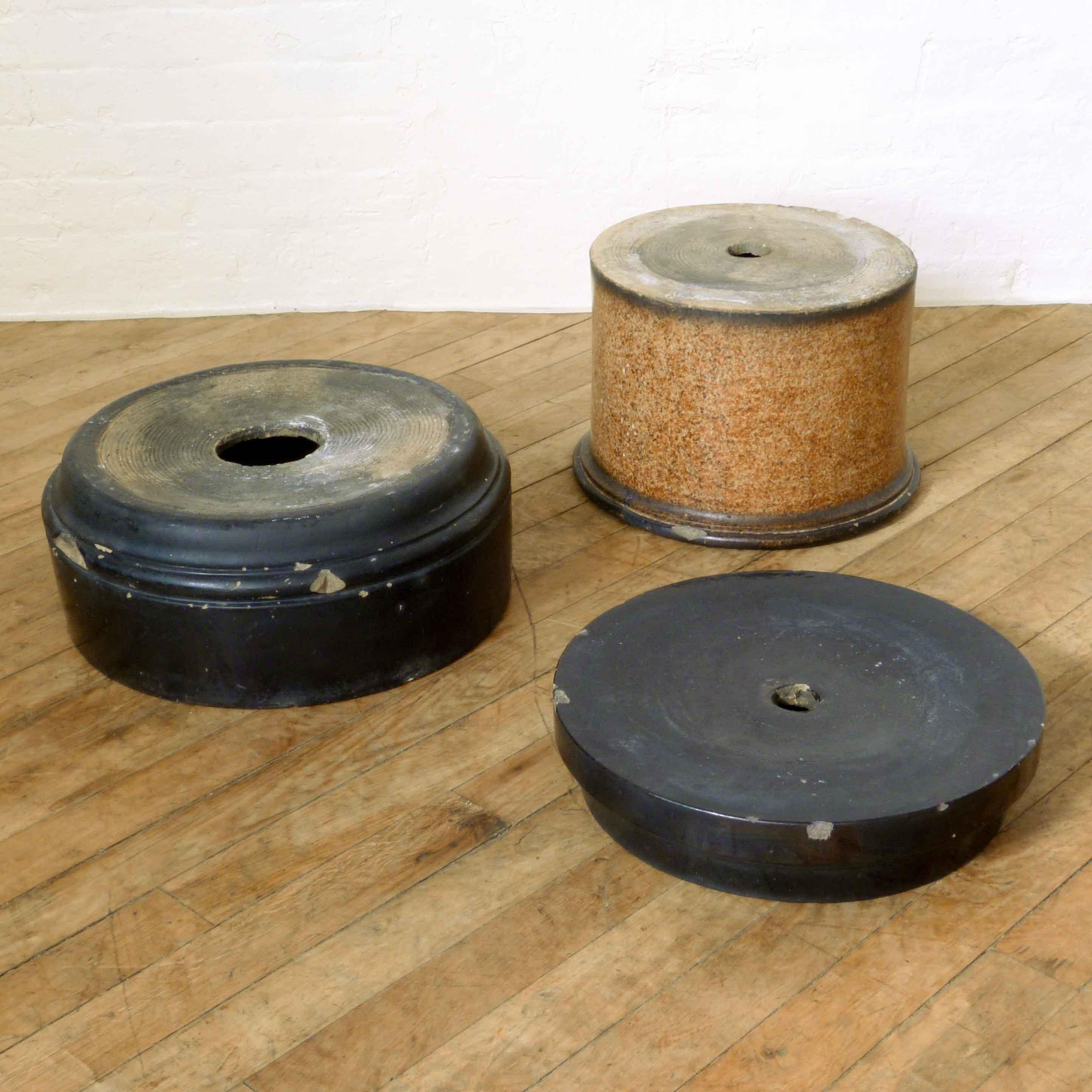 A fine pair of classical 18th century earthenware terracotta plinths. Each plinth breaks down into 3 sections, the top and bottom have a black glazed finish whilst the central section is a wonderful pseudo russet colored granite. There are numerous