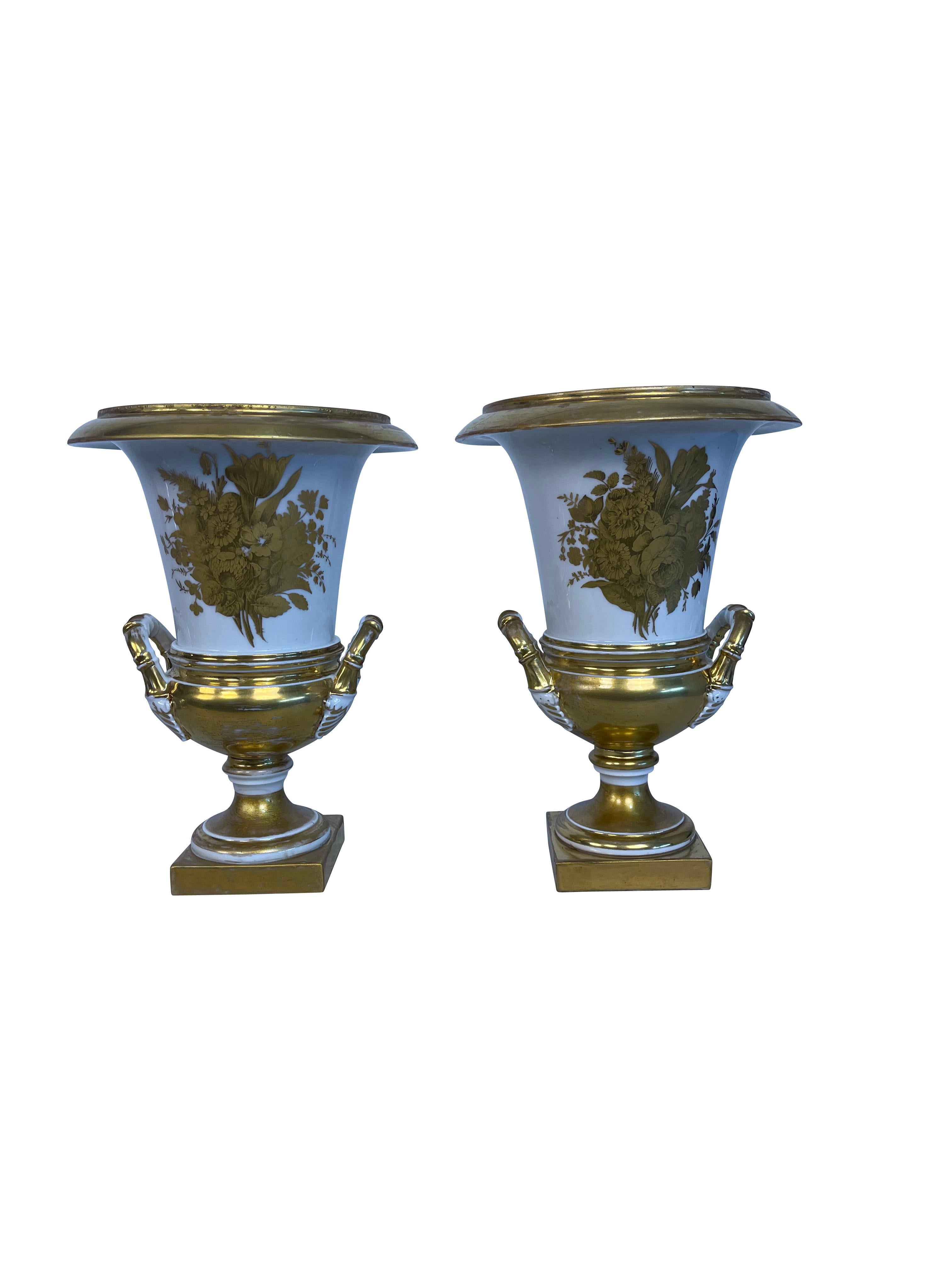 Hand-Crafted Pair of 18th Century Porcelain de Paris Style White and Gold Urns Vases