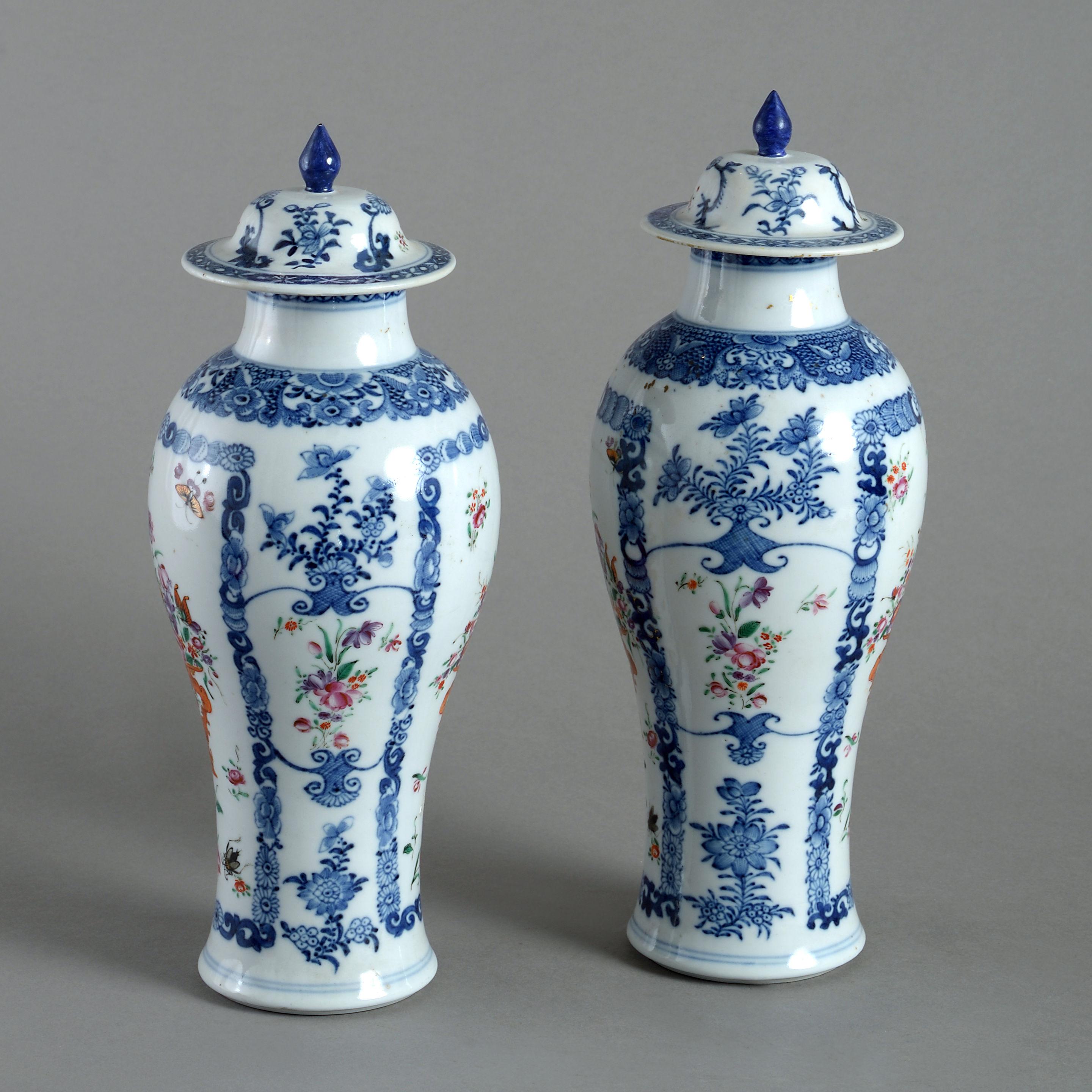 A fine pair of late 18th century porcelain vases and covers of baluster form, decorated with polychrome floral vignettes upon a white ground. 

Qing Dynasty, Qianlong Period