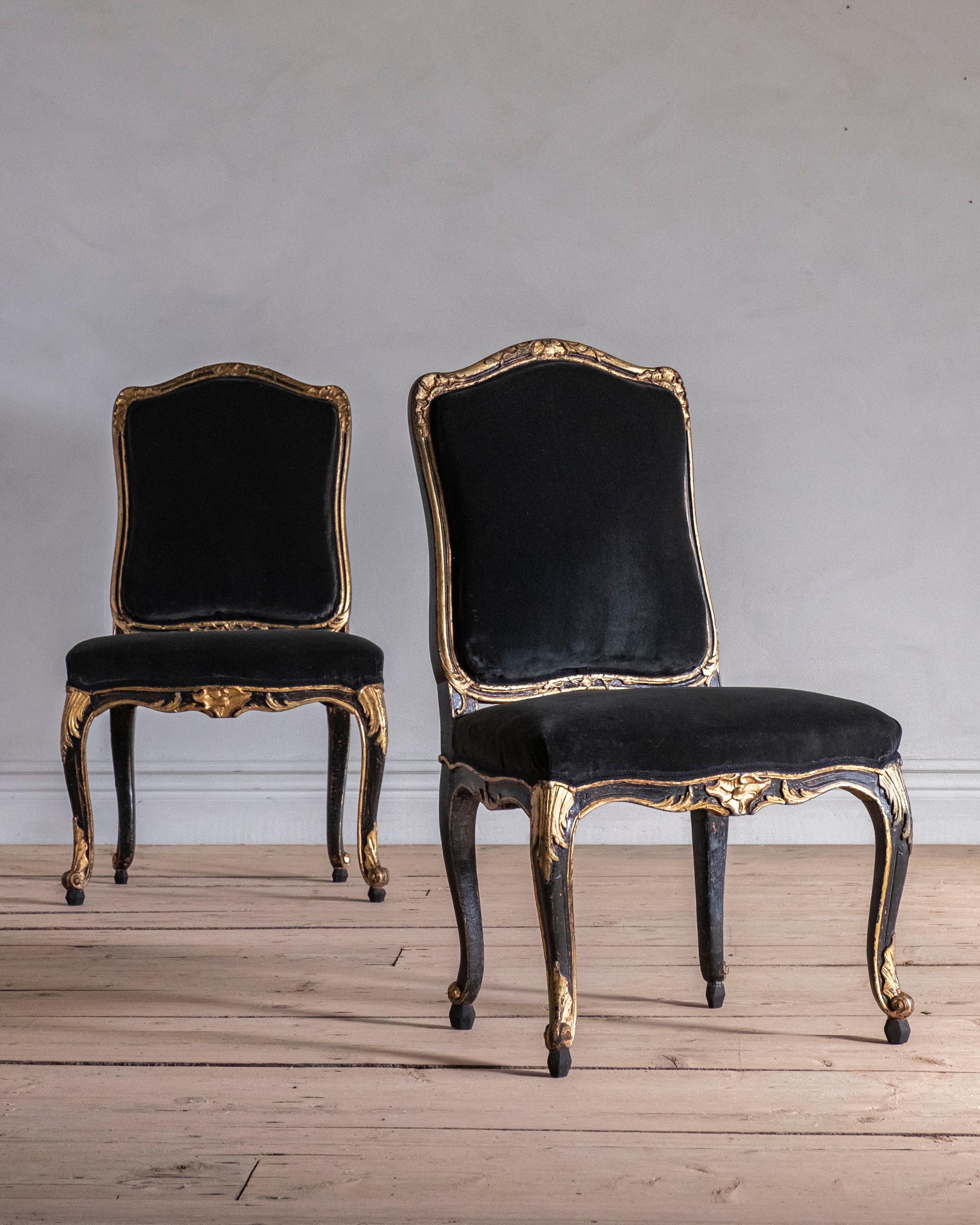 Fine pair of Swedish 18th century chairs in good proportions and shape, circa 1760. Good condition and historically restored, circa 1850 where the black and gold was applied. Newly raised feet. Wear and tear consistent with age and use.