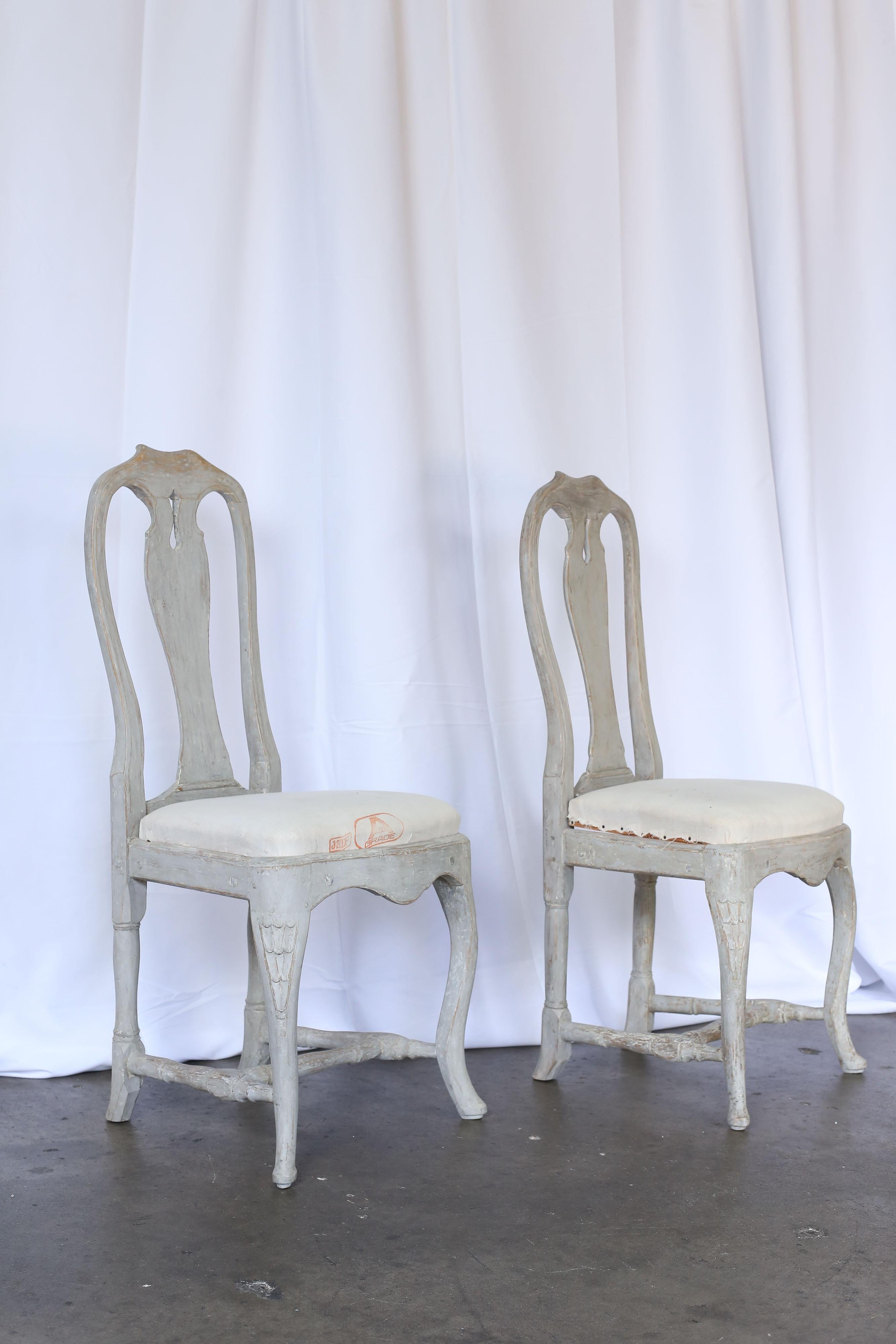 Pair of Rococo chairs, period circa 1780, Sweden with original paint.