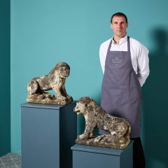 Pair of 18th Century style Weathered Limestone Lion Statues