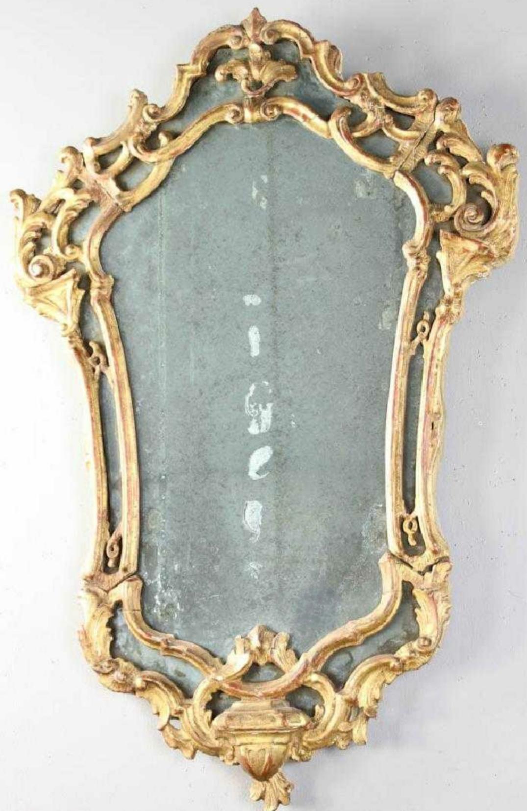 This is a lovely pair of Venetian mirrors and sized perfectly to fit in many applications. The gilt is in good condition and mirror is foxed beautifully with a good amount of reflection.