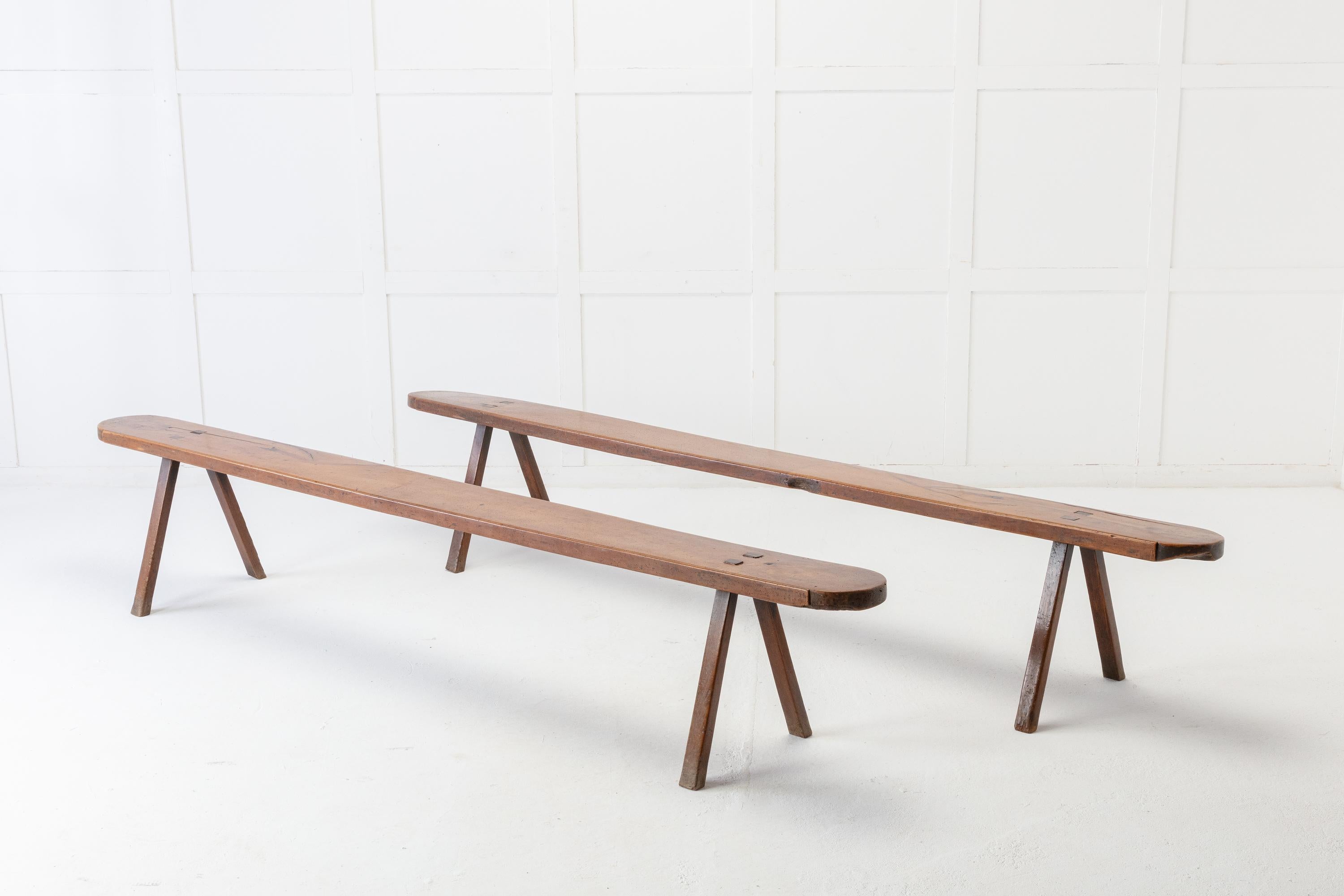 Pair of 18th century walnut benches, having a wonderful rich colour. A practical and simple seating solution.
 
