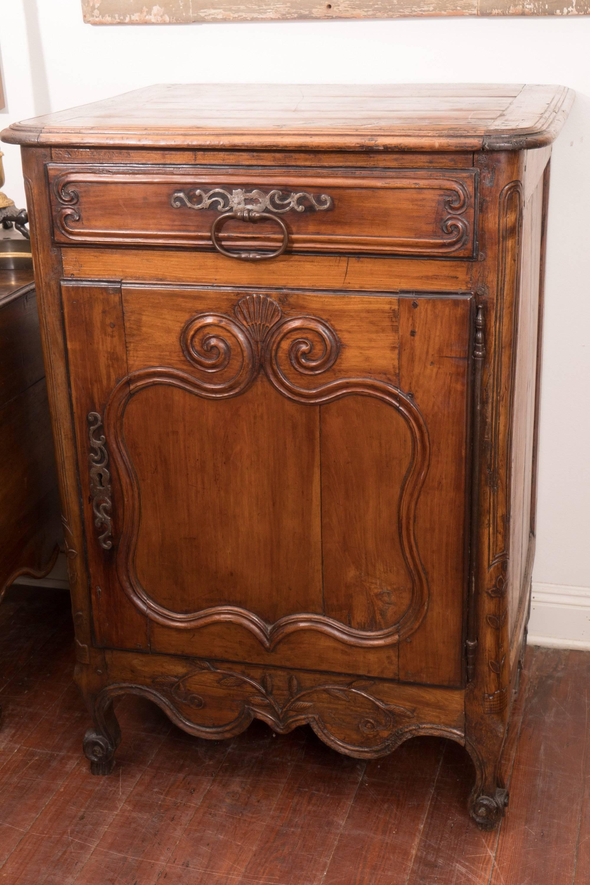 Pair of 18th century walnut cabinets with original hardware and lovely patina.