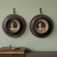 Pair of 18th century Wax "Damned Souls" Roundels