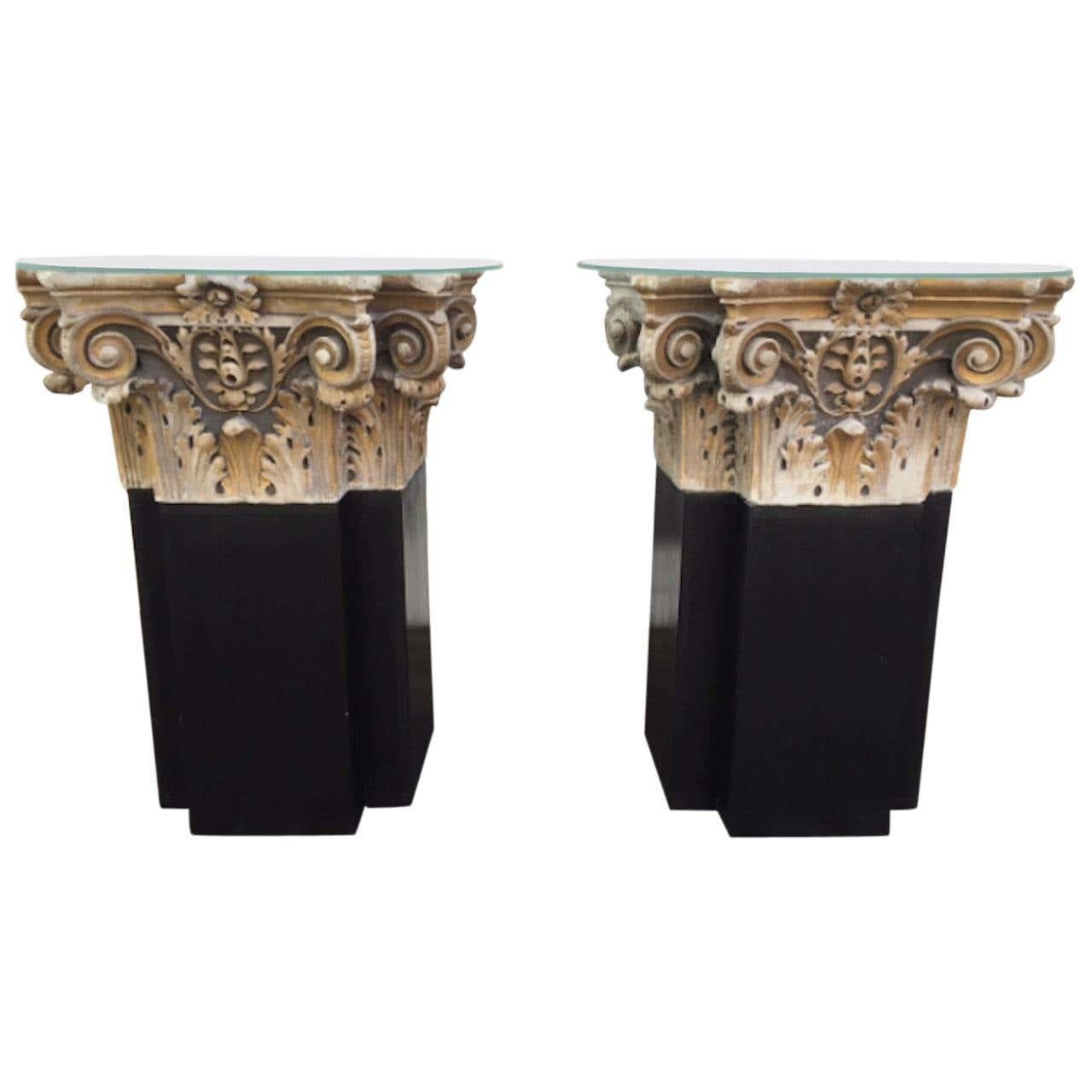 A pair of 18th century white marble and gold gilt columns tops from a Italy's church. Converted into side tables these beautiful crafted column feature excellent flawless carving of scrolls and foliage. Perfect for a interior or exterior use.
