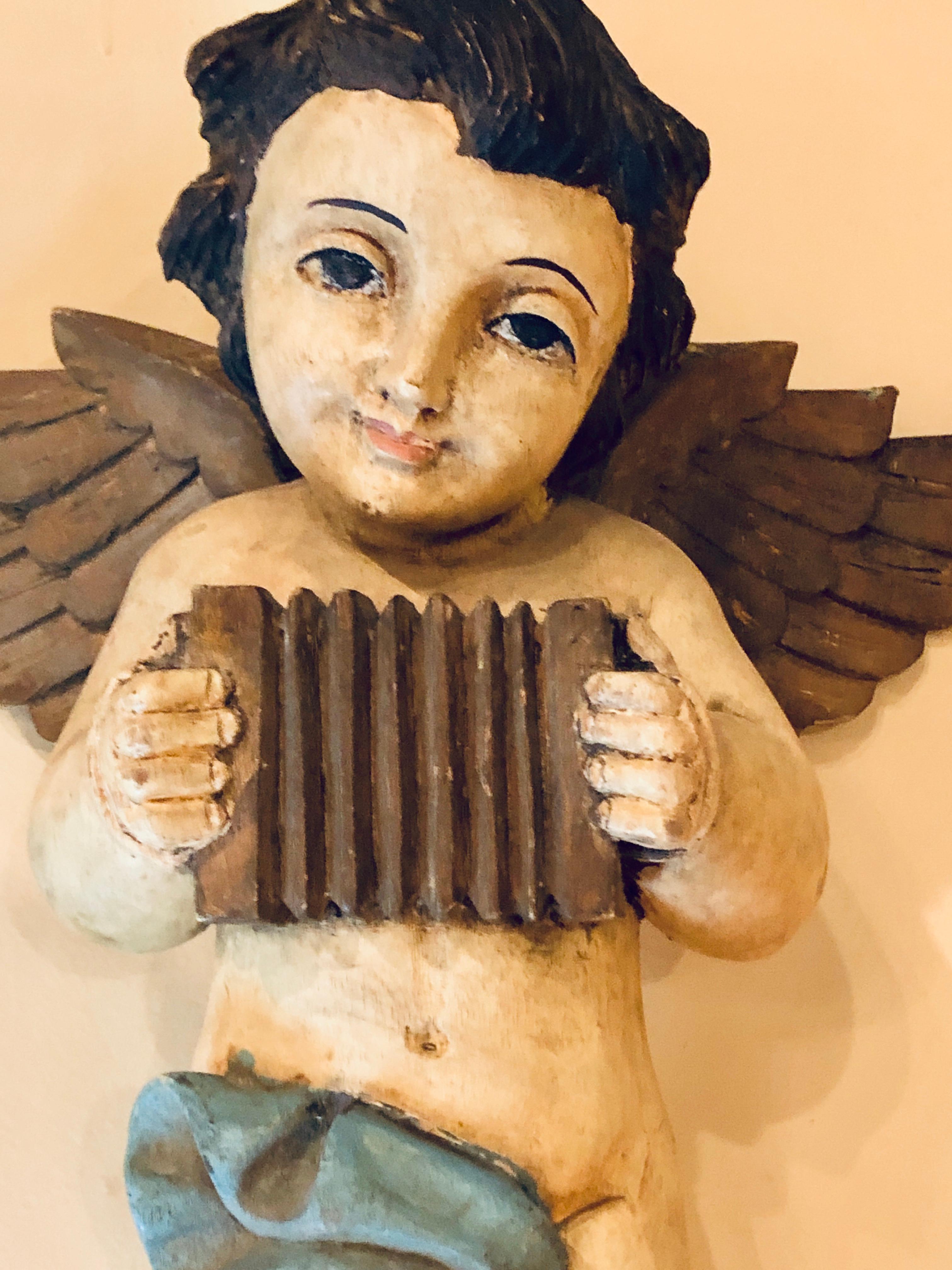 Pair of 19th-20th Century Continental Painted Antique Winged Babies or Cherubs In Good Condition In Stamford, CT