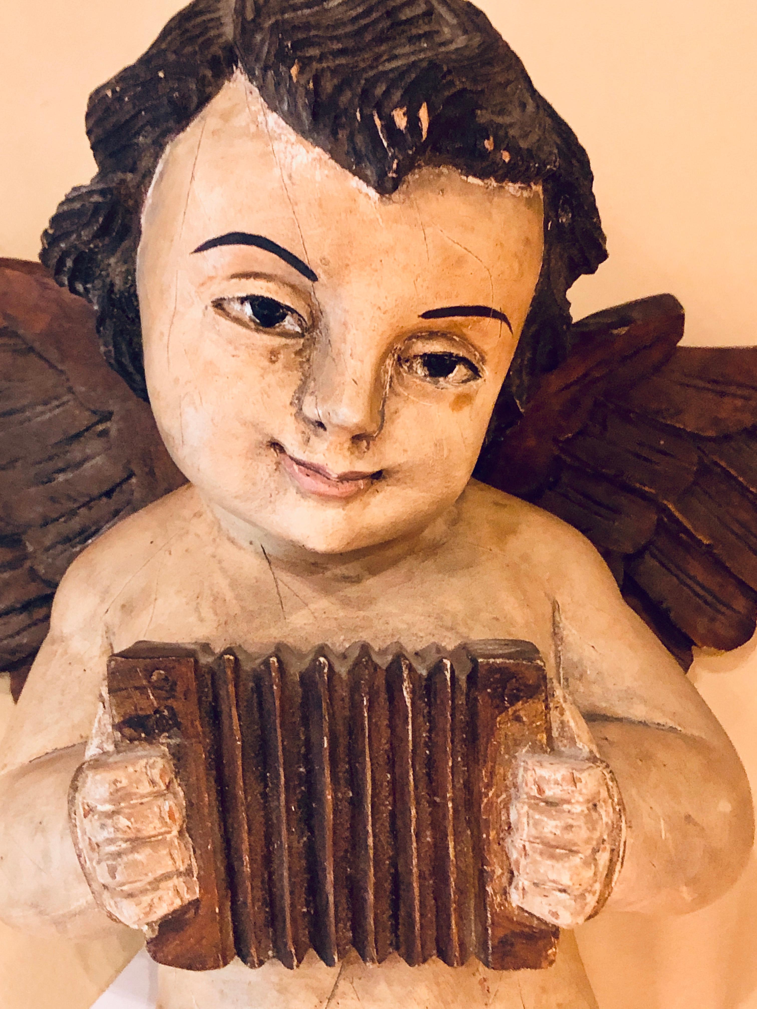 Pair of 19th-20th Century Continental Painted Antique Winged Babies or Cherubs 1