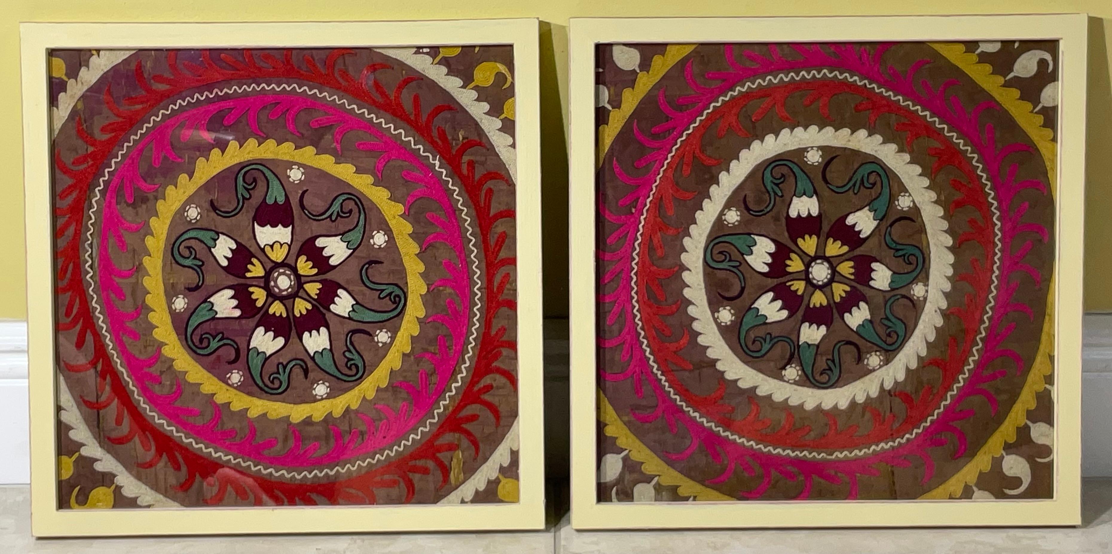Beautiful pair of wall handing ,made of silk ,hand embroidery silk on background silk  textile , floral and vine of circle of life motif ,professionally mounted on cotton backing . 
backing sewn together by hand, framed with front acrylic glass like