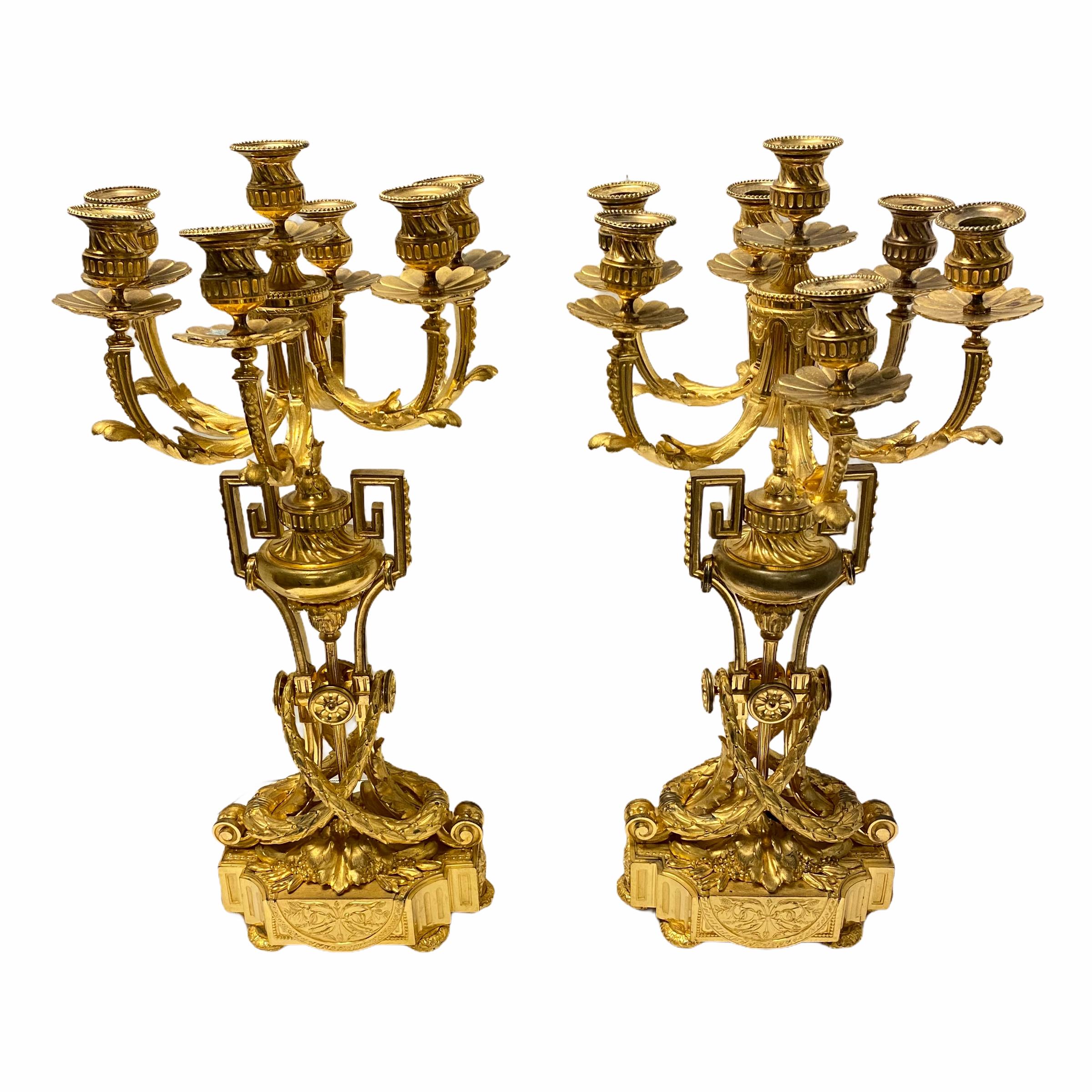 Pair of finest quality French 19 century Louis XIV style gilt bronze seven-light candelabras.