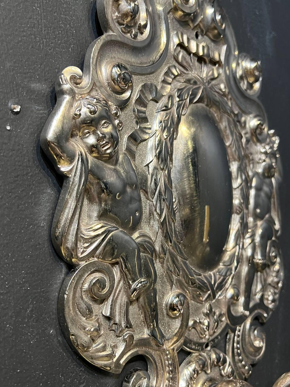 American Classical Pair of 1900's Caldwell Silver Plated Sconces with Cherubs For Sale