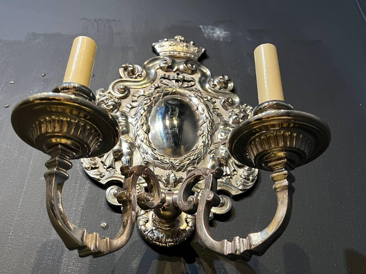 Engraved Pair of 1900's Caldwell Silver Plated Sconces with Cherubs For Sale