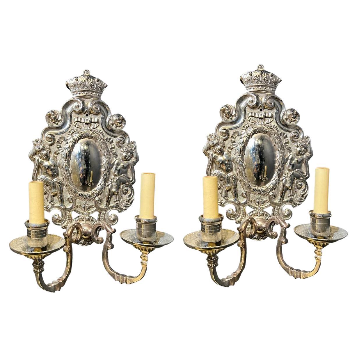 Pair of 1900's Caldwell Silver Plated Sconces with Cherubs