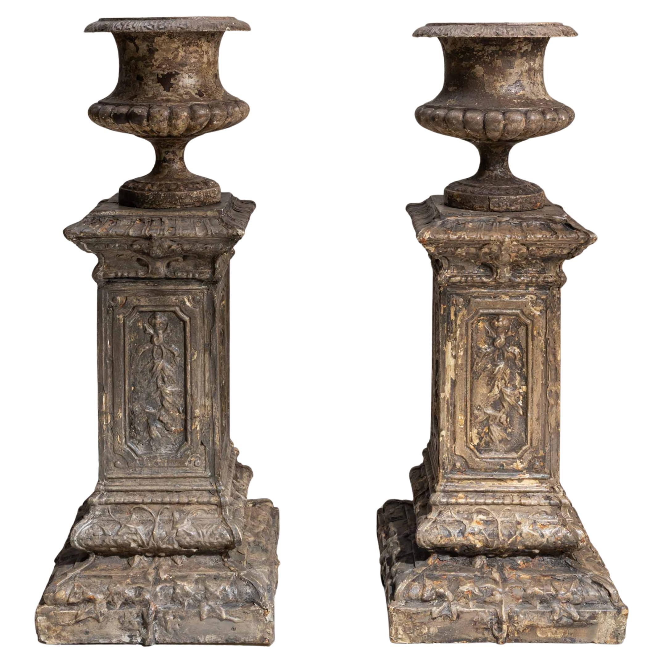 Pair Of 1900s French Neoclassical Cast Iron Urns On Pedestals By Alfred Corneau