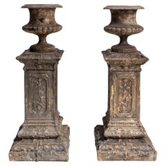 Pair Of 1900s French Neoclassical Cast Iron Urns On Pedestals By Alfred Corneau