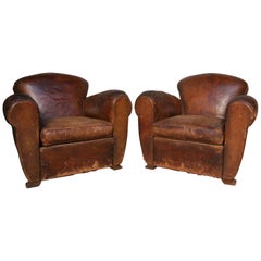 Paire de fauteuils club en cuir Art déco des années 1920