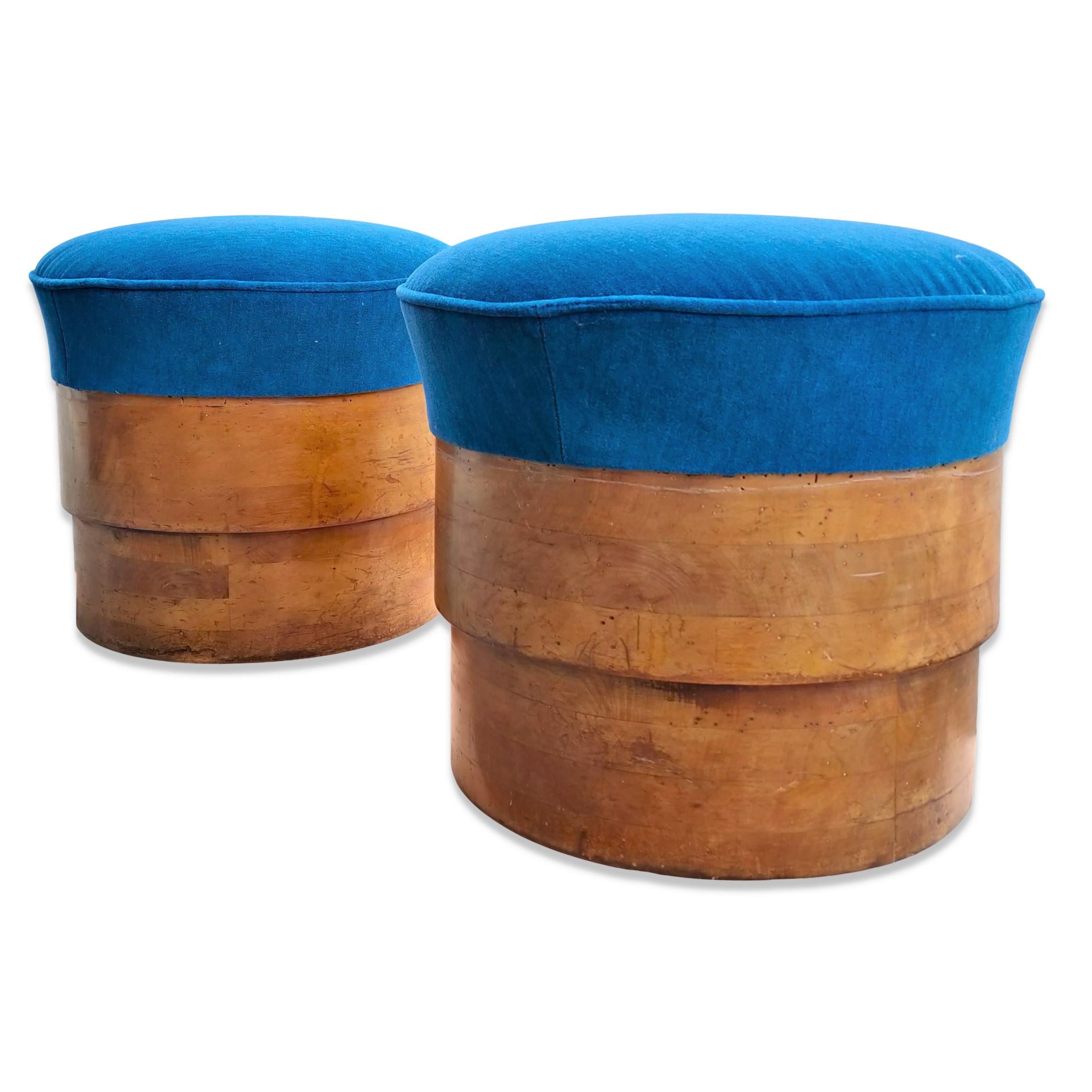 Elegant pair of early 2Oth century stools
the base is made of two stacked circles of dense solid fruitwood (probably pear tree)
the stools have been elegantly restored with a gloss varnish 
the blue mohair upholstery is new as well 
these stools