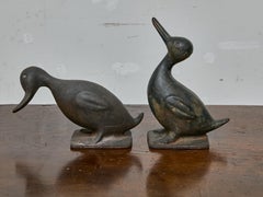Pair of 1920s Cast Iron Duck Figures with Folk Charm and Patinated Finish