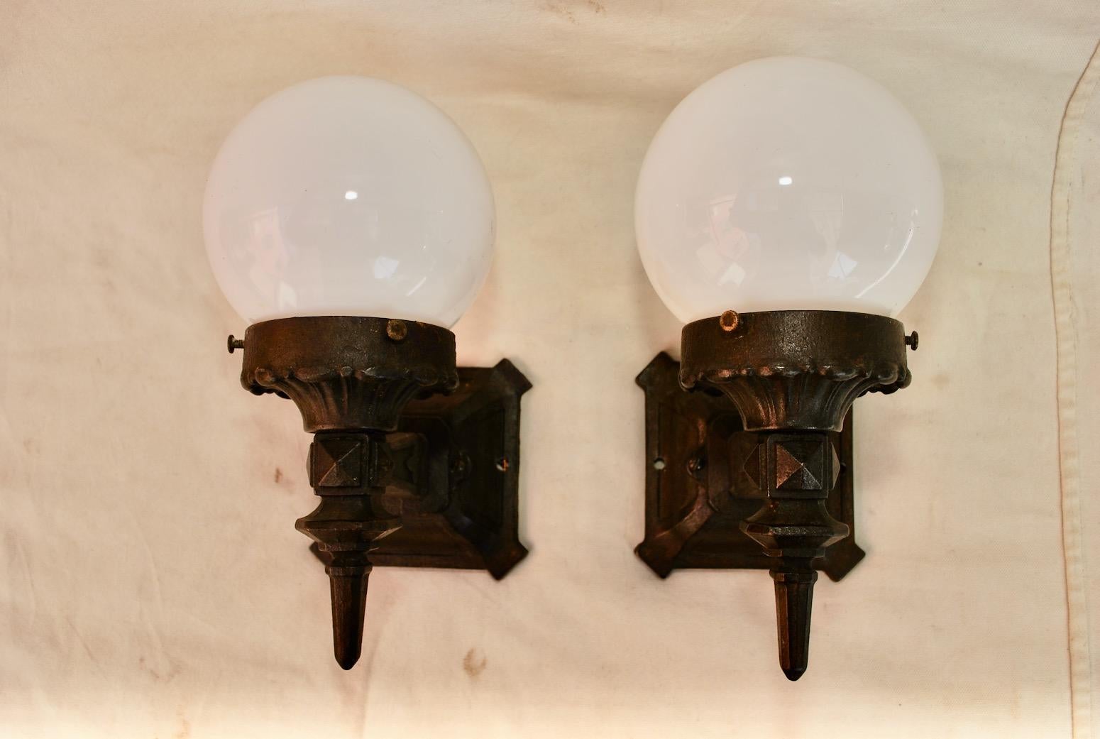 A good quality pair of 1920s cast iron sconces, they are in great condition.

 