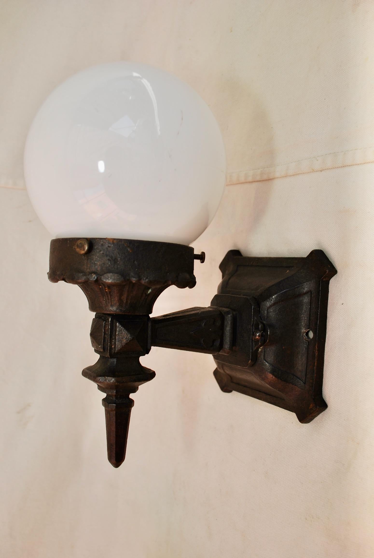 Pair of 1920s Cast Iron Outdoor Sconces 1