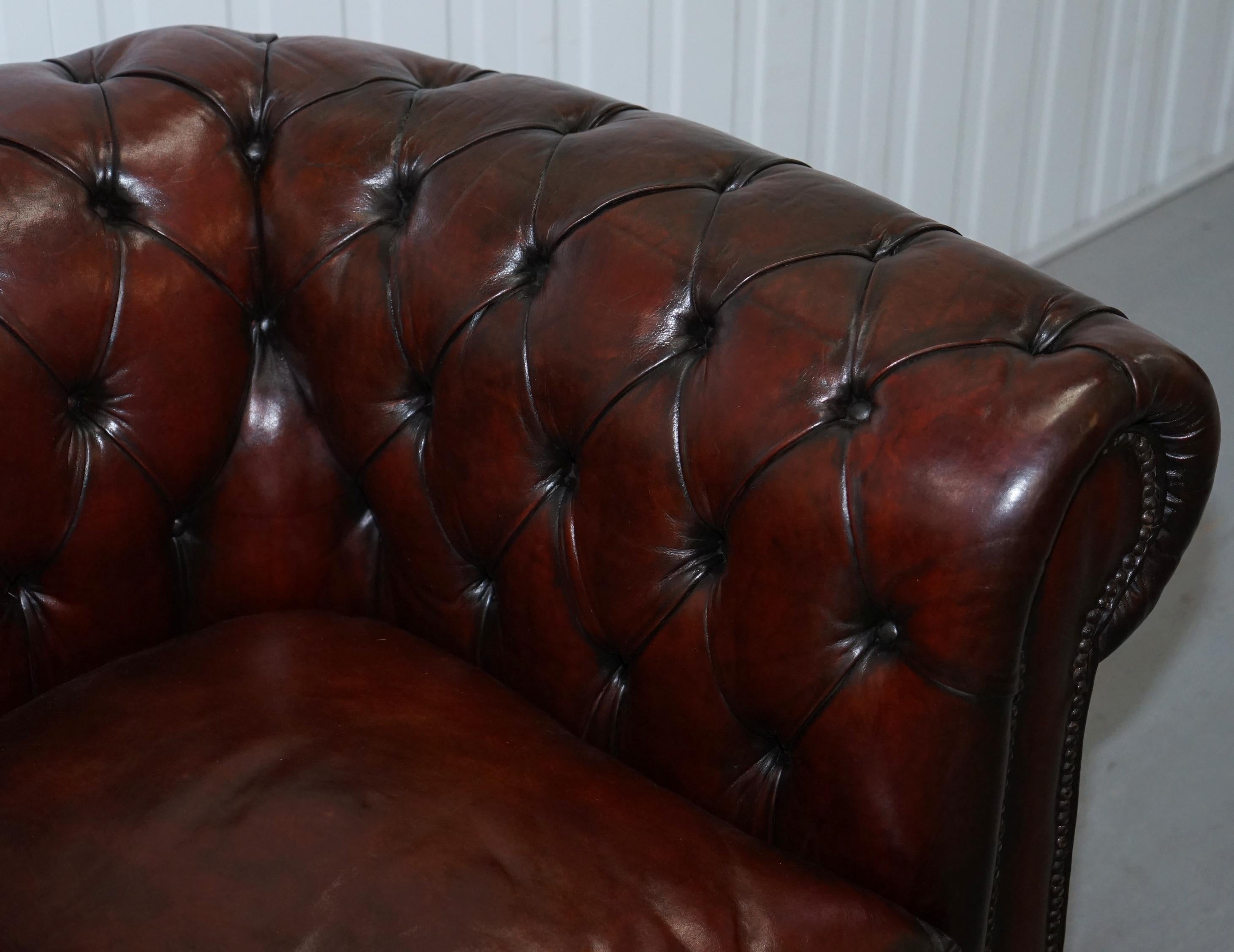 Pair of 1920s Chesterfield Hand Dyed Brown Leather Club Armchairs Walnut Feet 9