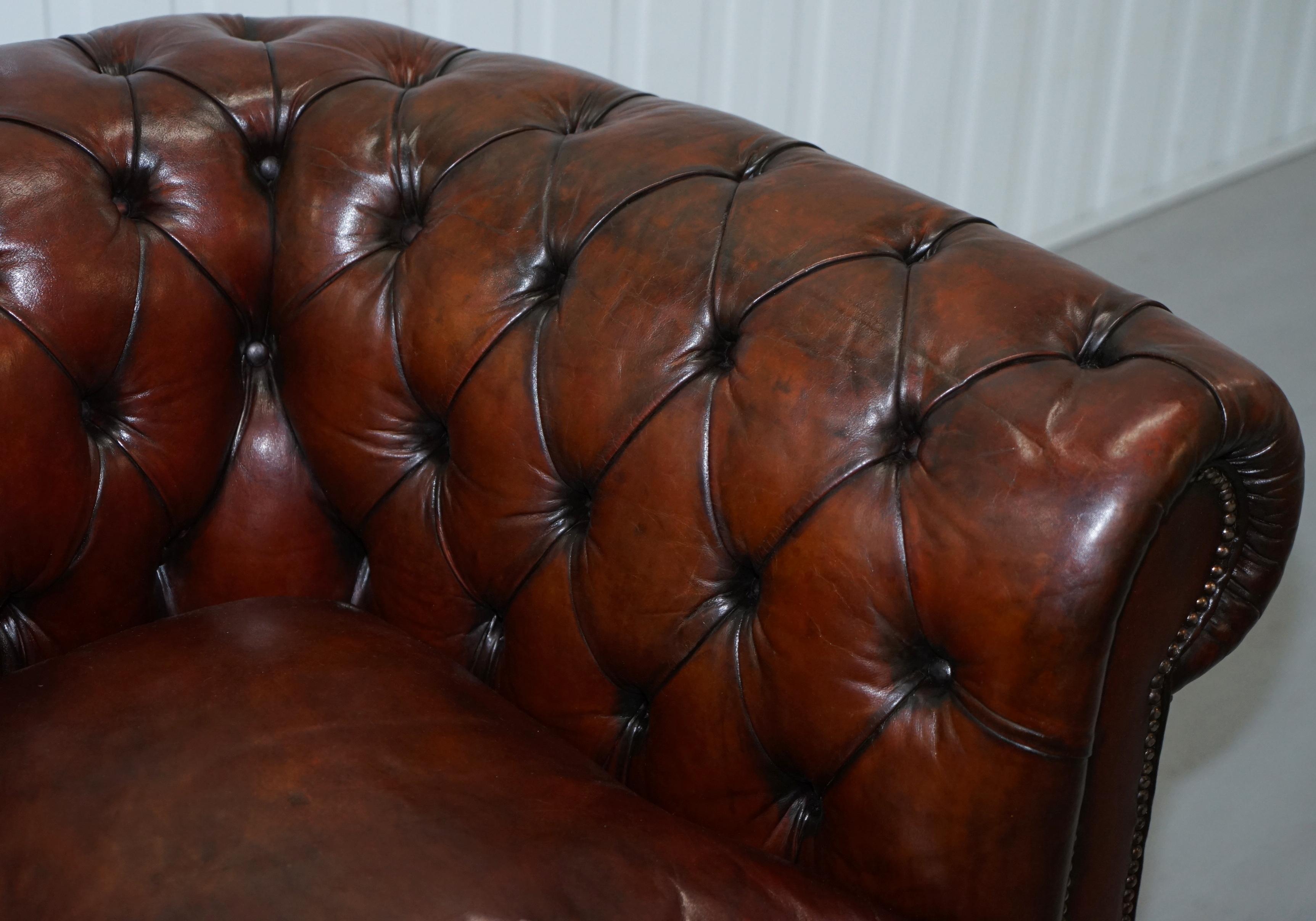 Early 20th Century Pair of 1920s Chesterfield Hand Dyed Brown Leather Club Armchairs Walnut Feet