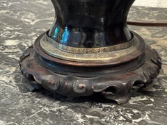 Pair of 1920s Chinese Vase Lamps With Carved Wood Bases