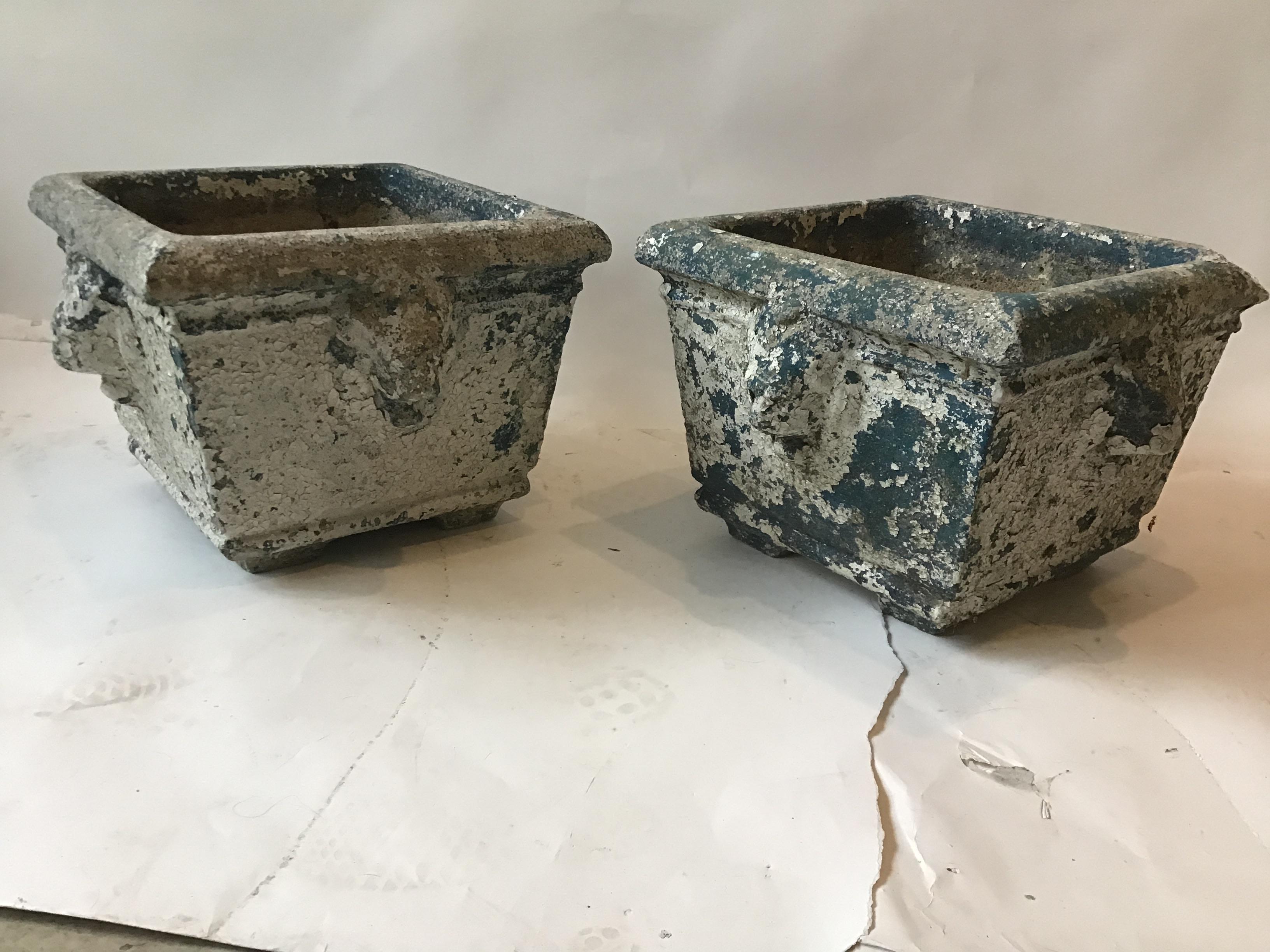 Pair of 1920s concrete lion head planters. From an East Hampton, NY estate.