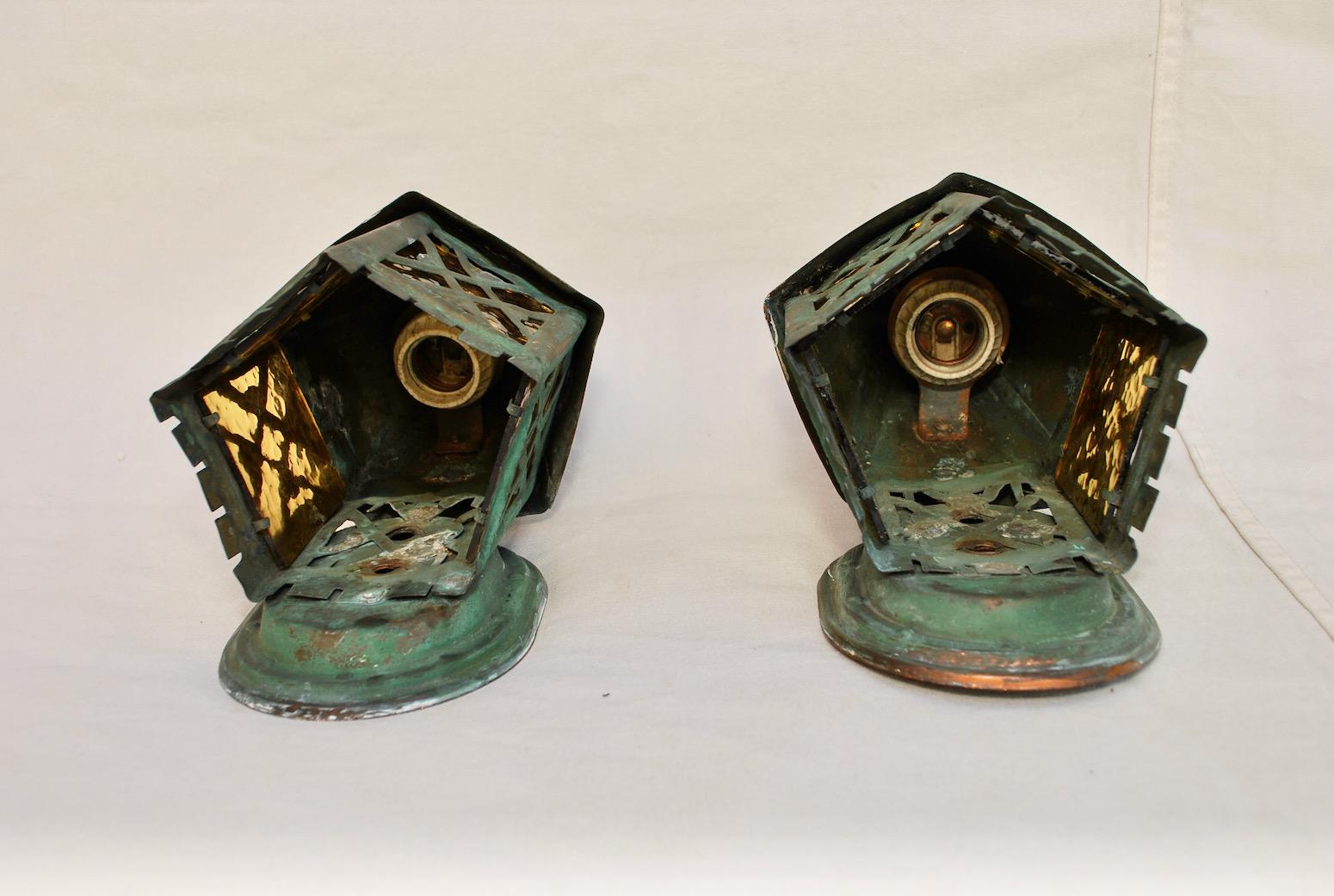 A very nice and cute 1920's outdoor copper sconces.