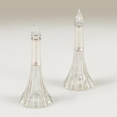 Pair of 1920s English Art Deco cut glass and silver collar bottles