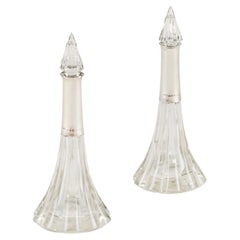 Pair of 1920s English Art Deco cut glass and silver collar bottles
