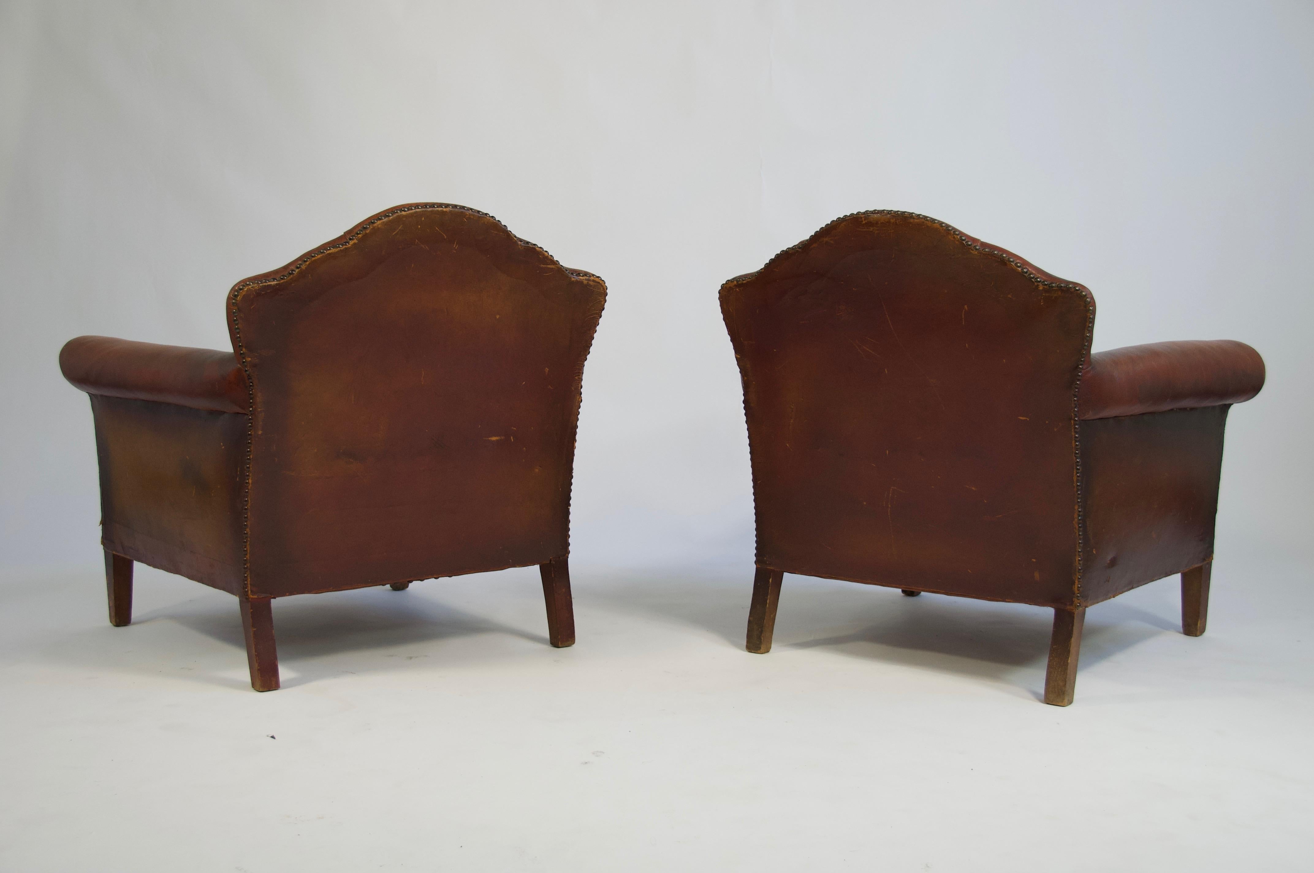 Arts and Crafts Pair of 1920s European Leather Lounge Chairs