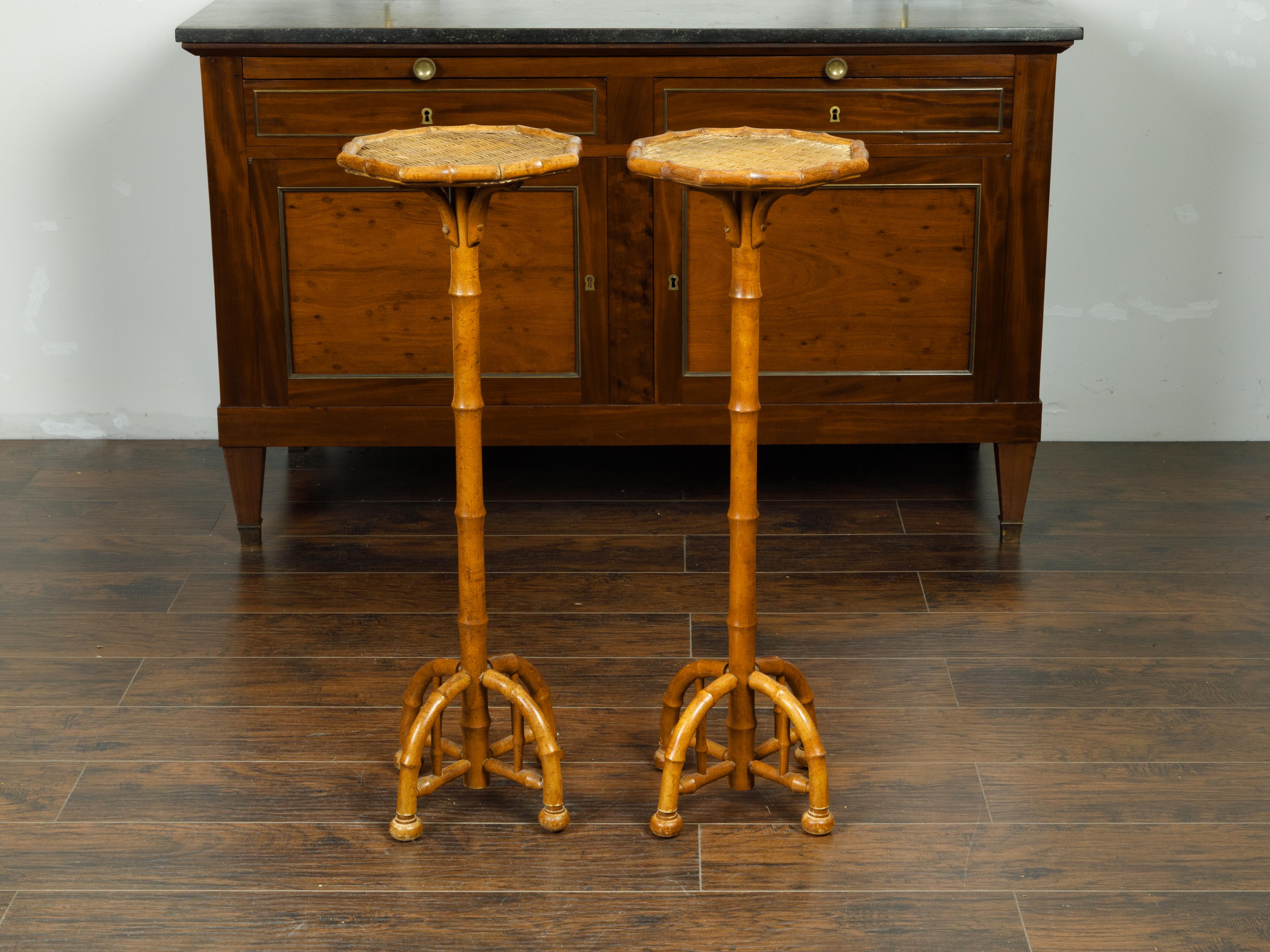 20th Century Pair of 1920s Faux Bamboo Stands with Octagonal Rattan Tops and Quadripod Bases