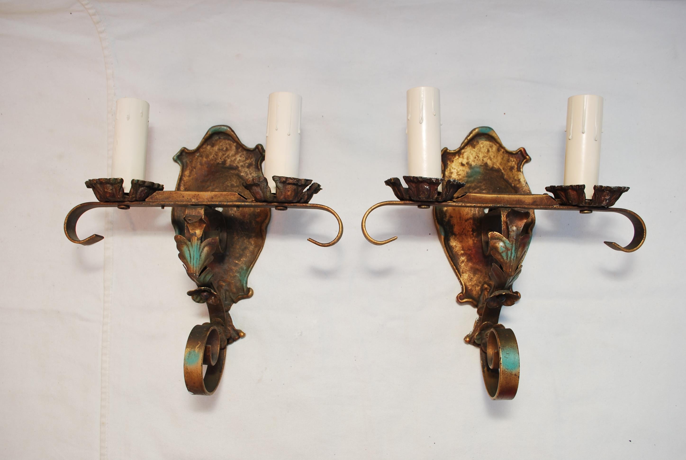 A nice pair of 1920's wrought iron sconces, the patina is allot nicer in person