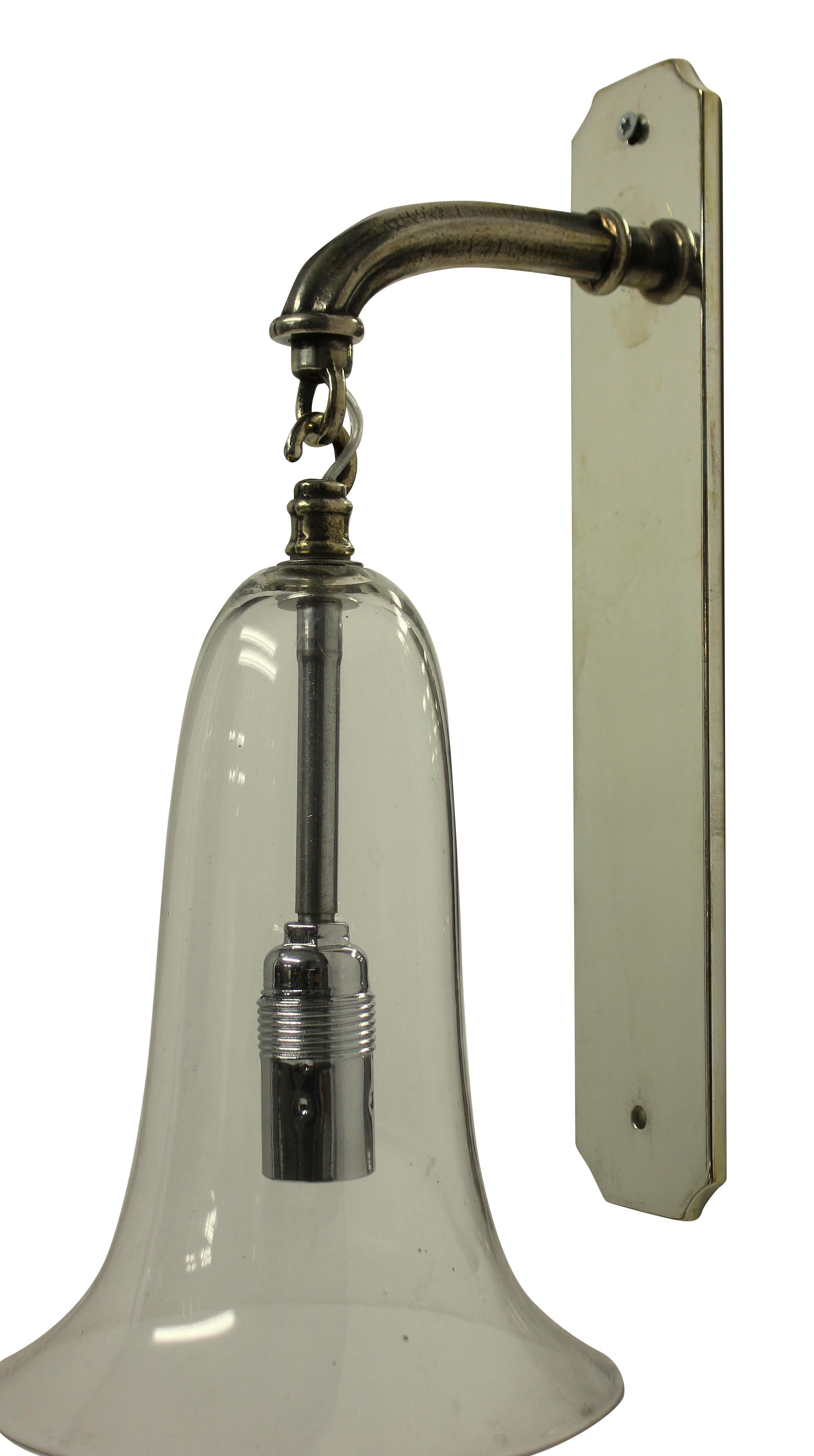 A pair of English silver plated single arm wall sconces with hanging glass 'bell' shades.