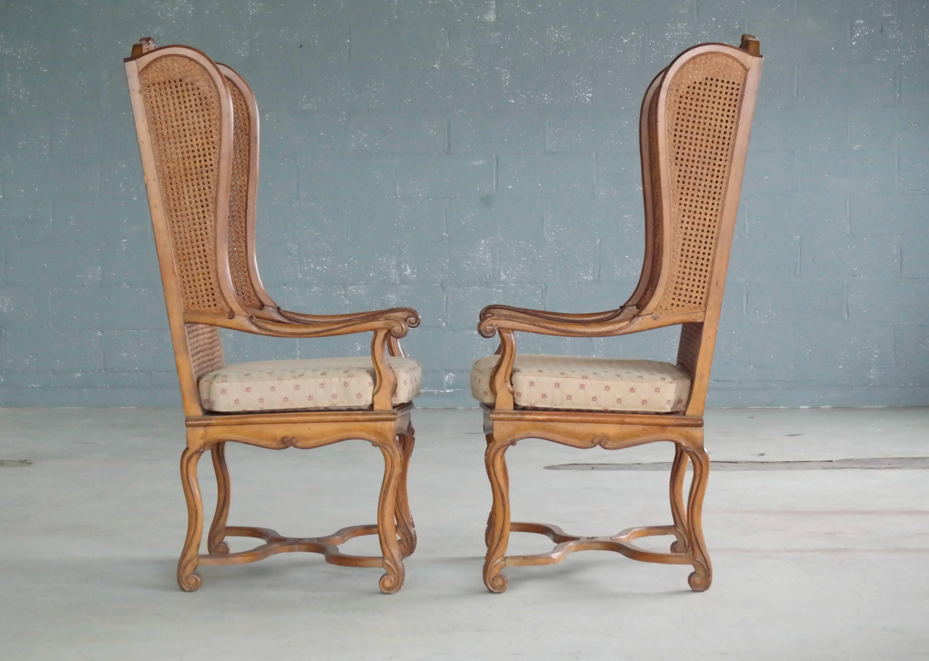 American Pair of 1920s Hollywood Regency Cane Wingback Chairs