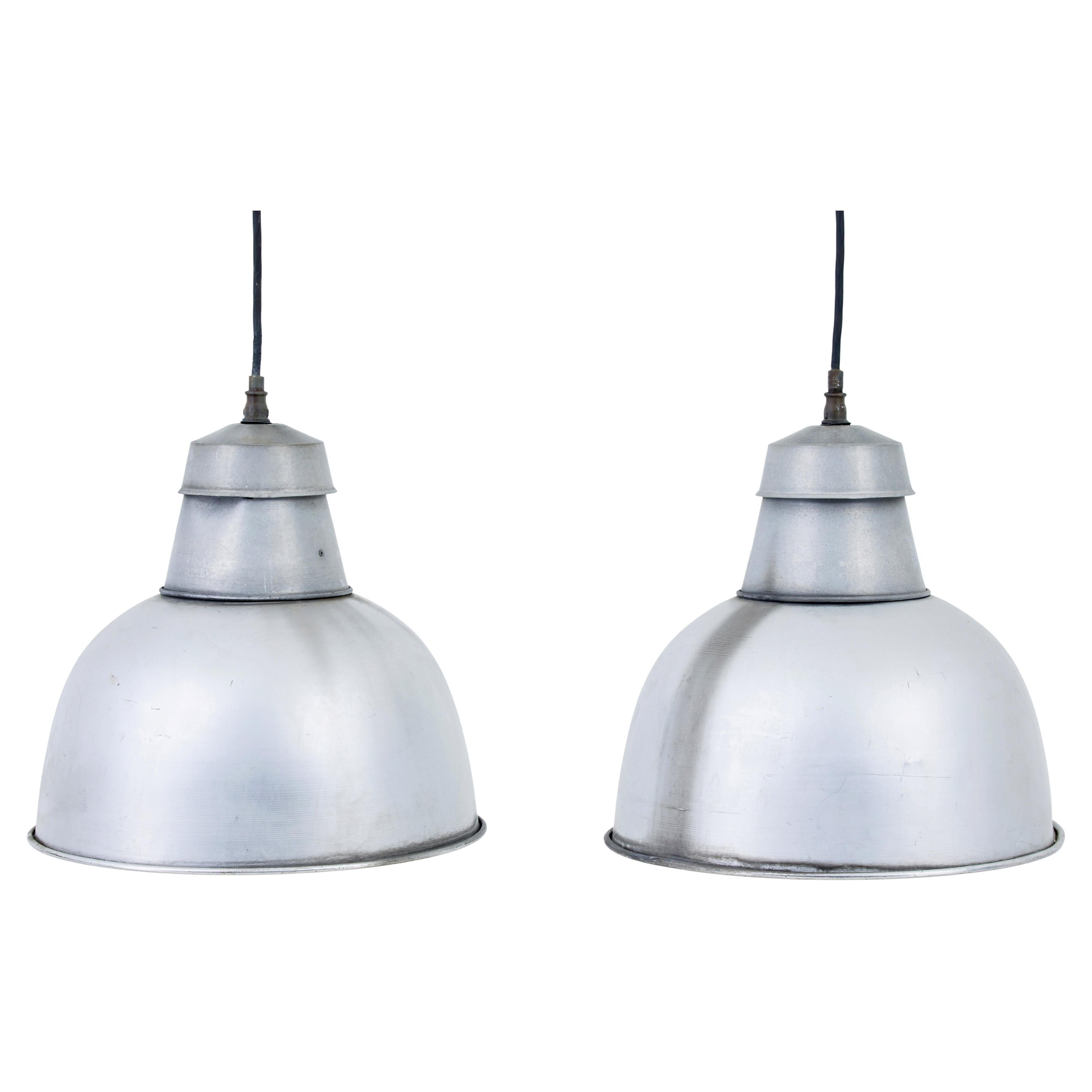 Pair of 1920’s industrial metal hanging ceiling lights