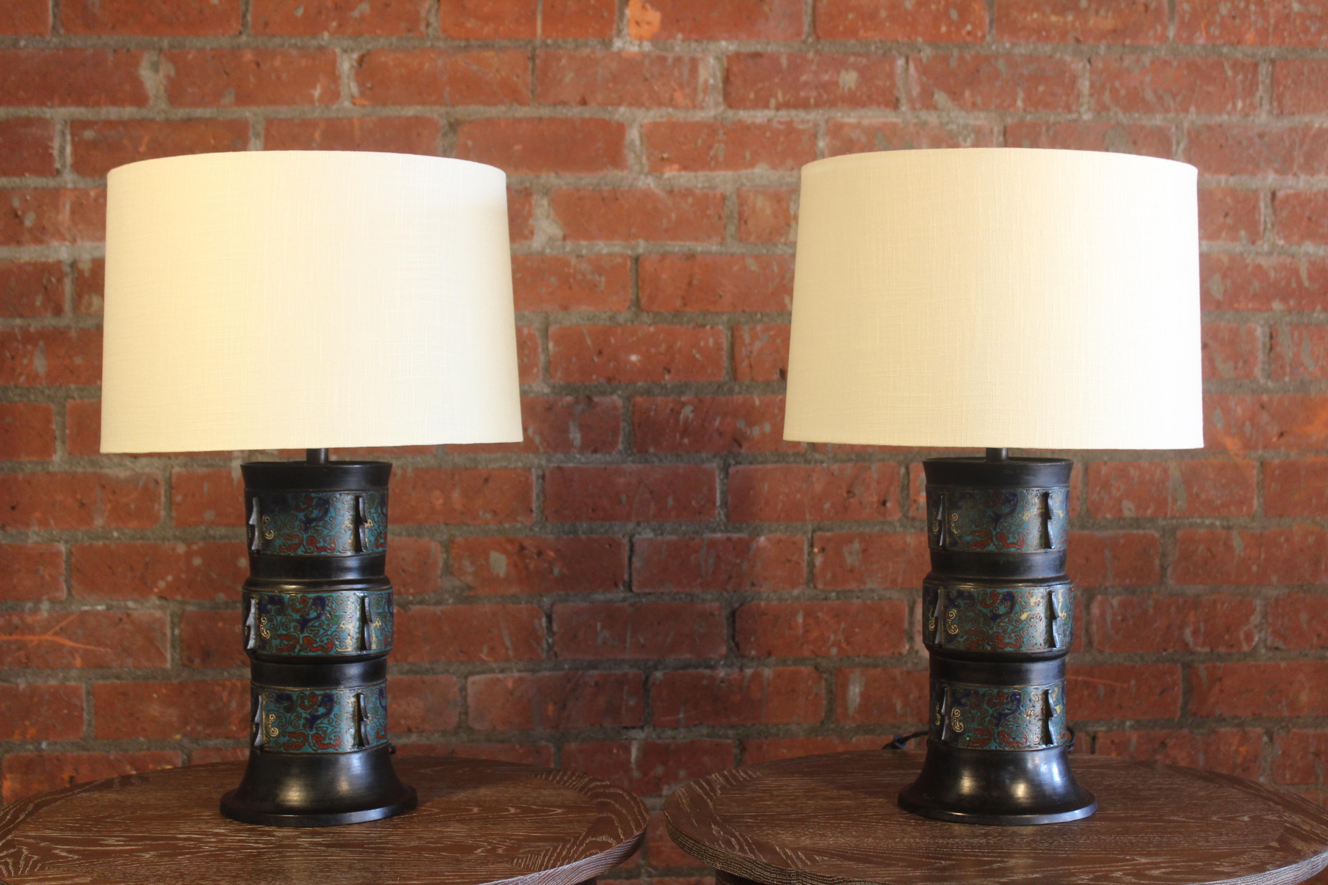 Pair of antique bronze cloissone vase table lamps. Newly rewired and fitted with custom made linen shades. Sold as a pair.