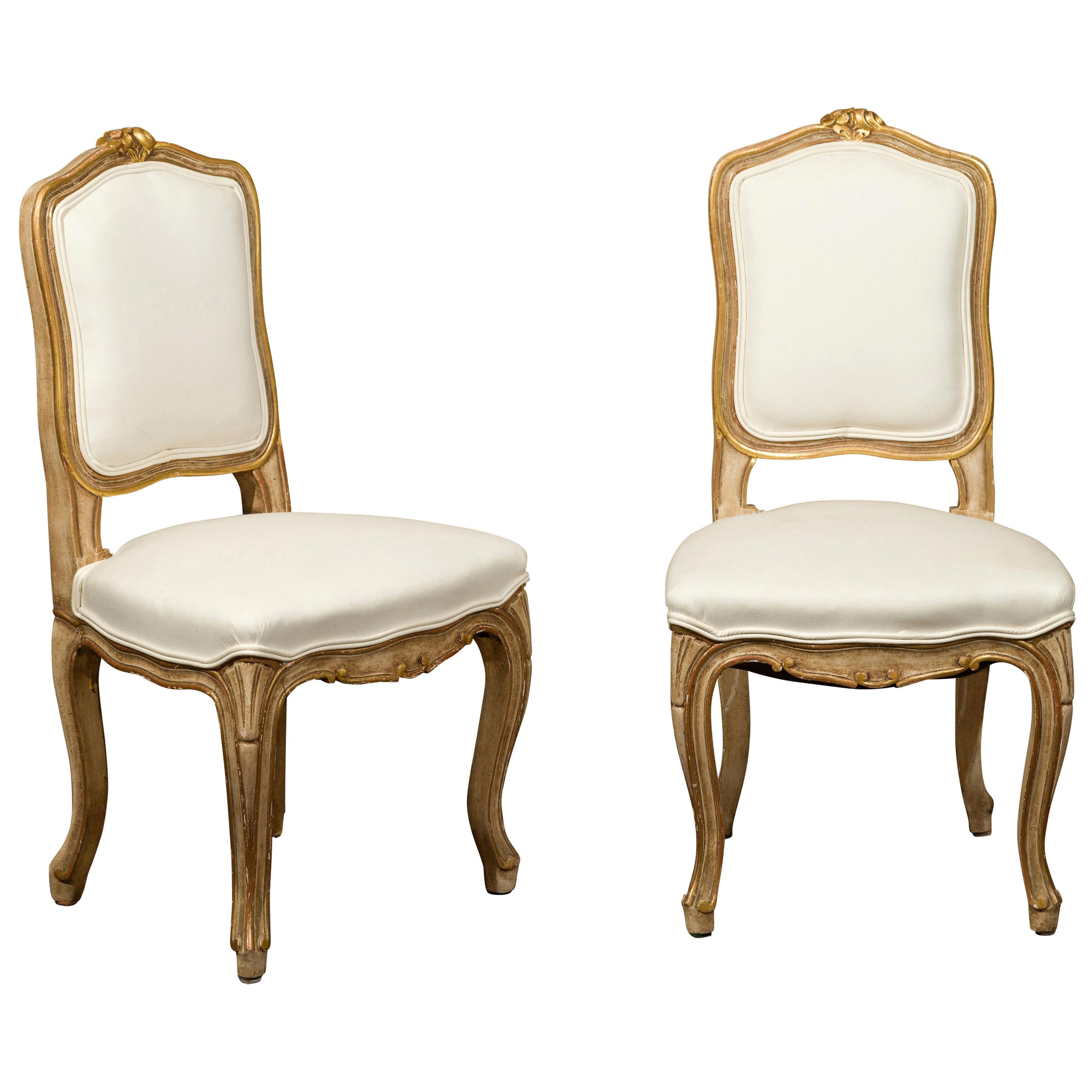 Pair of 1920s Louis XV Style Painted and Gilt Child's Chairs with Carved Flowers For Sale