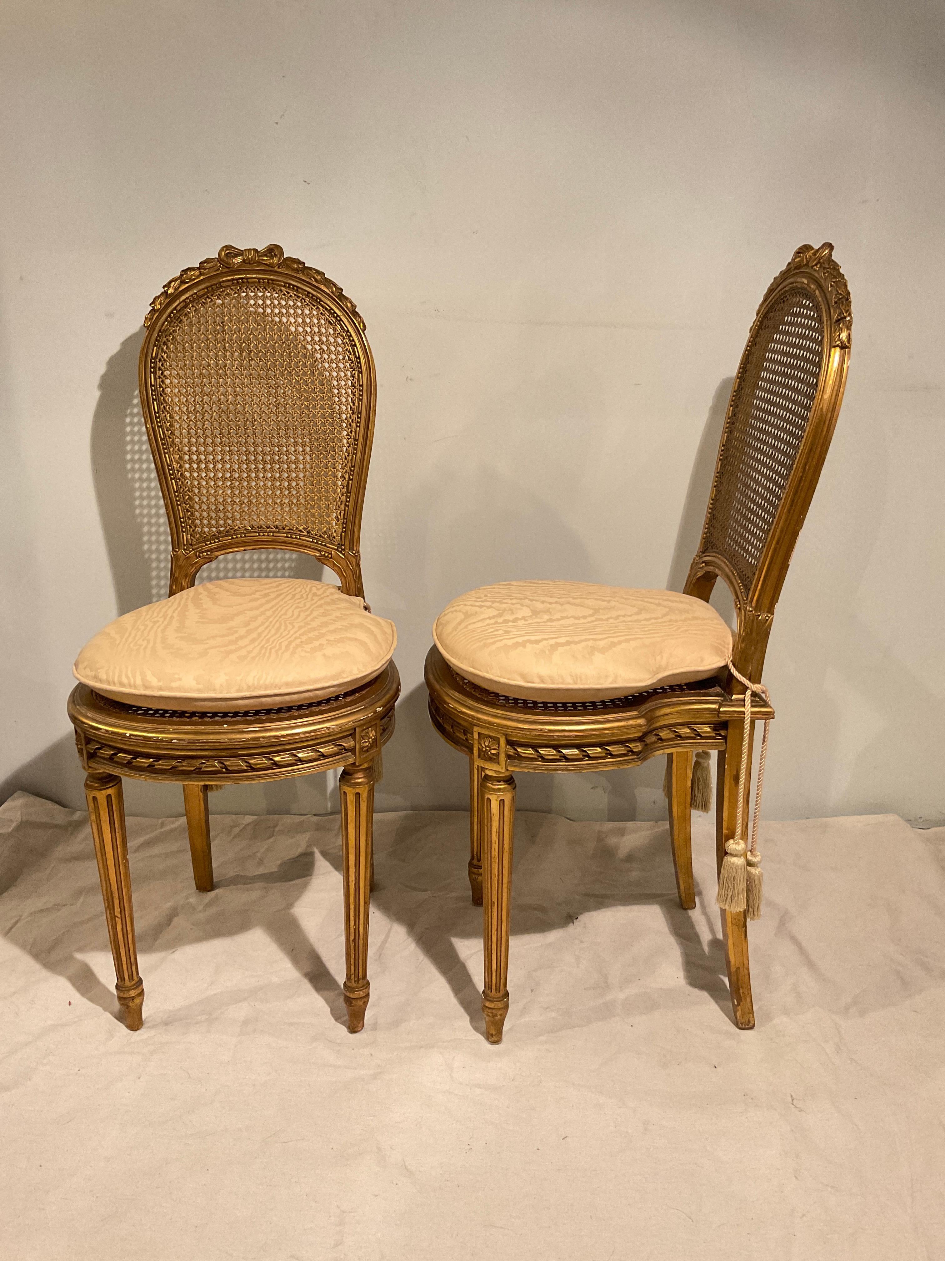 Pair of 1920s gilt wood petite side chairs.