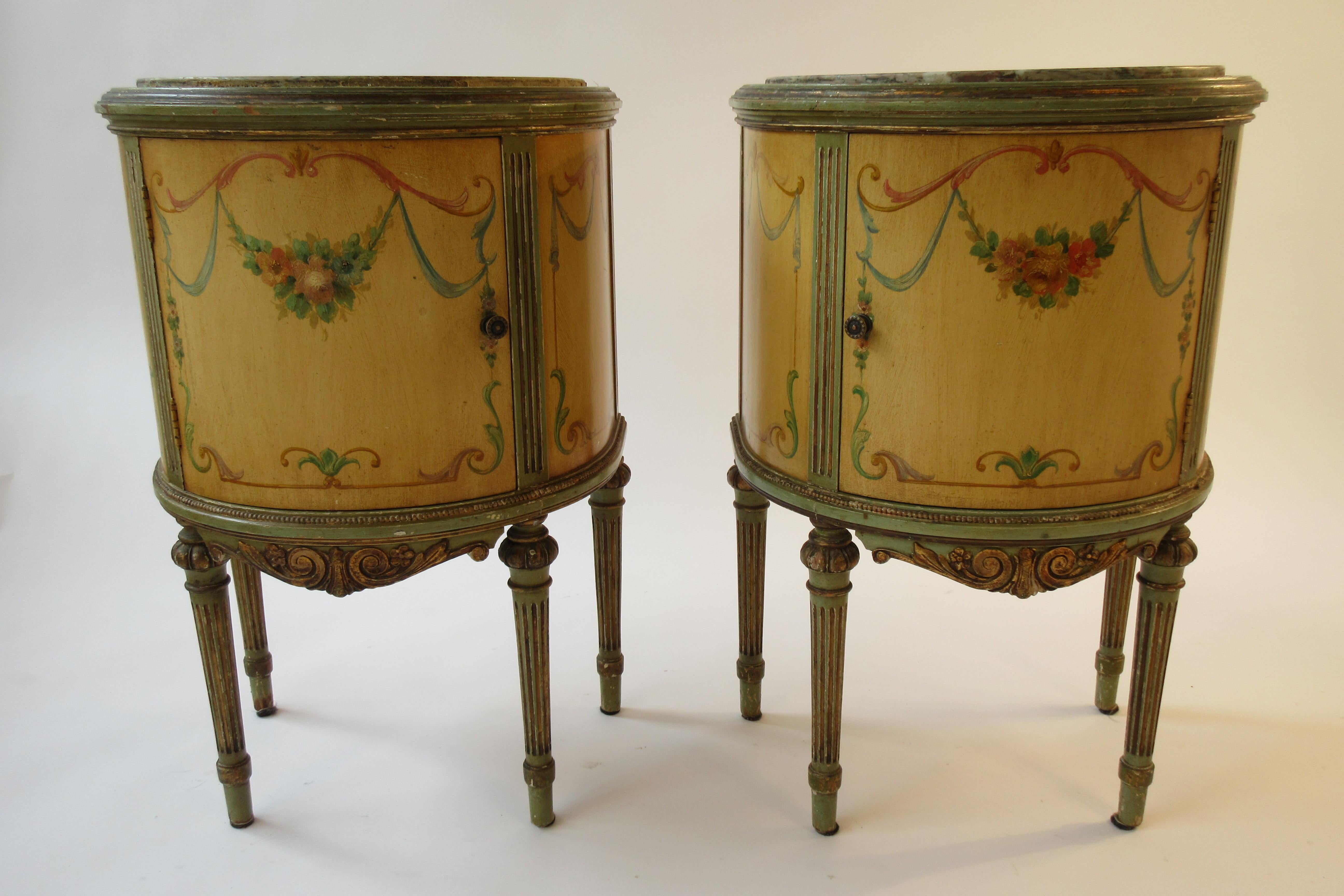 Pair of 1920s marble top Adams style demilunes. Hand painted. One piece of marble has an old repair. Some of the beeding is missing, some beeding has come off, but I do have it. You can either glue the beeding back on, or take it all off.