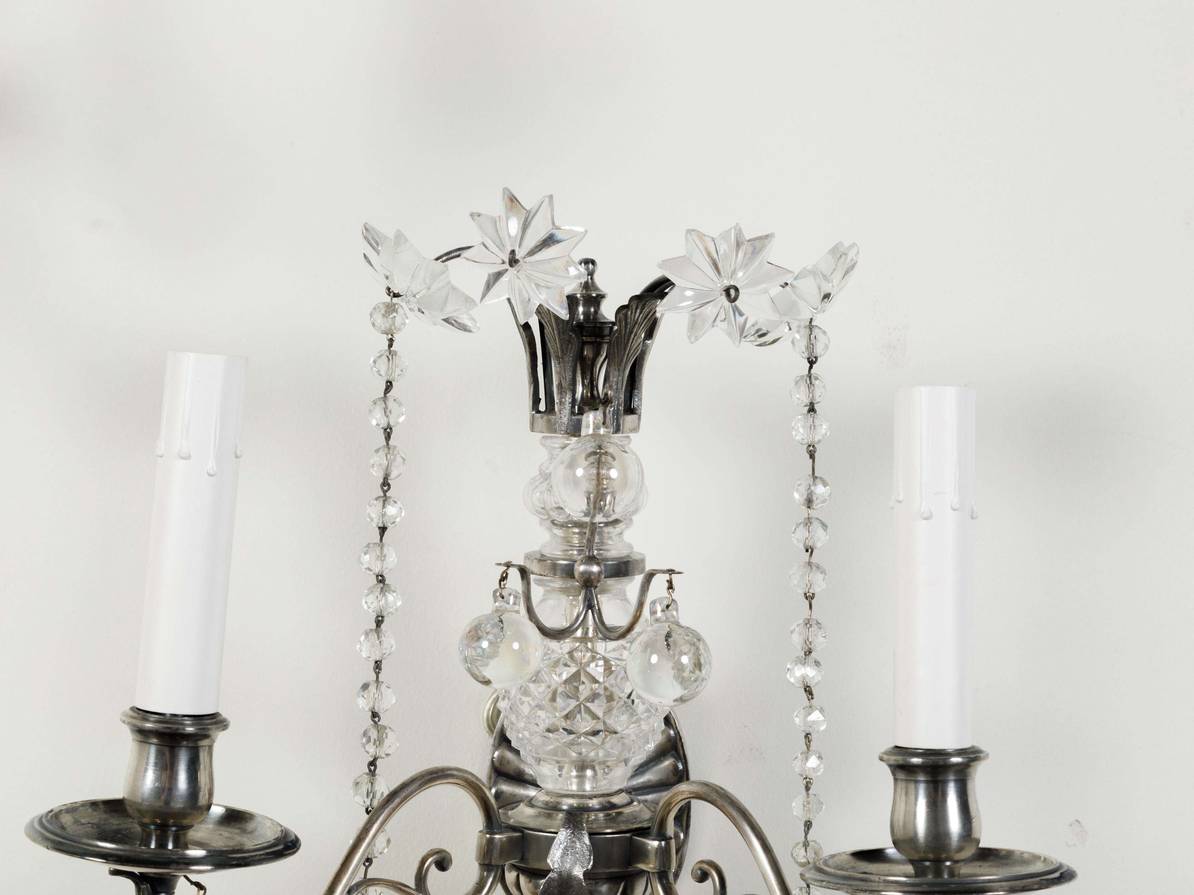 Pair of 1920s Metal and Crystal Two-Arm Wall Sconces with Beads and Rosettes For Sale 4